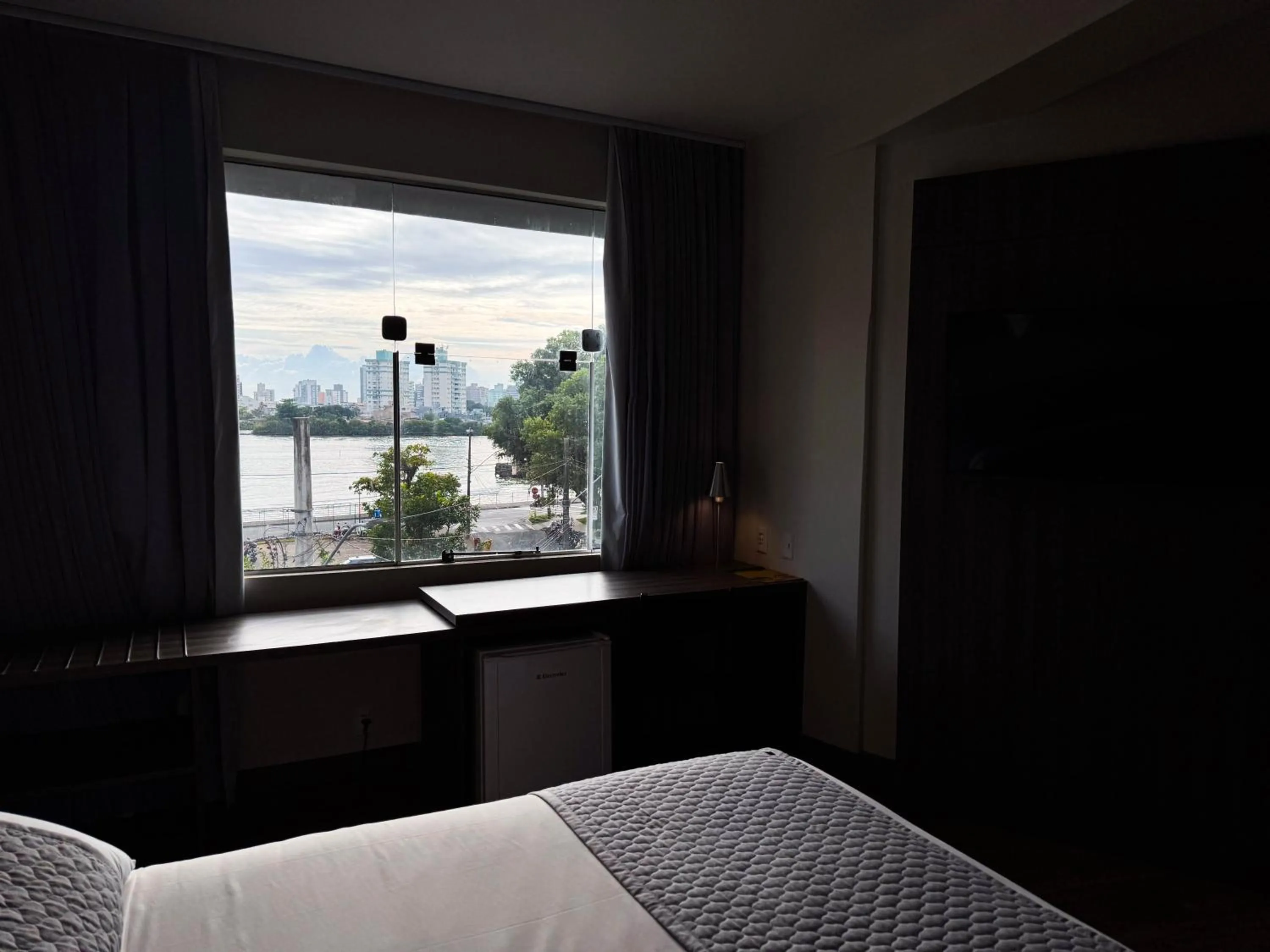 View (from property/room), Bed in Hotel Valerim Itajaí / Navegantes