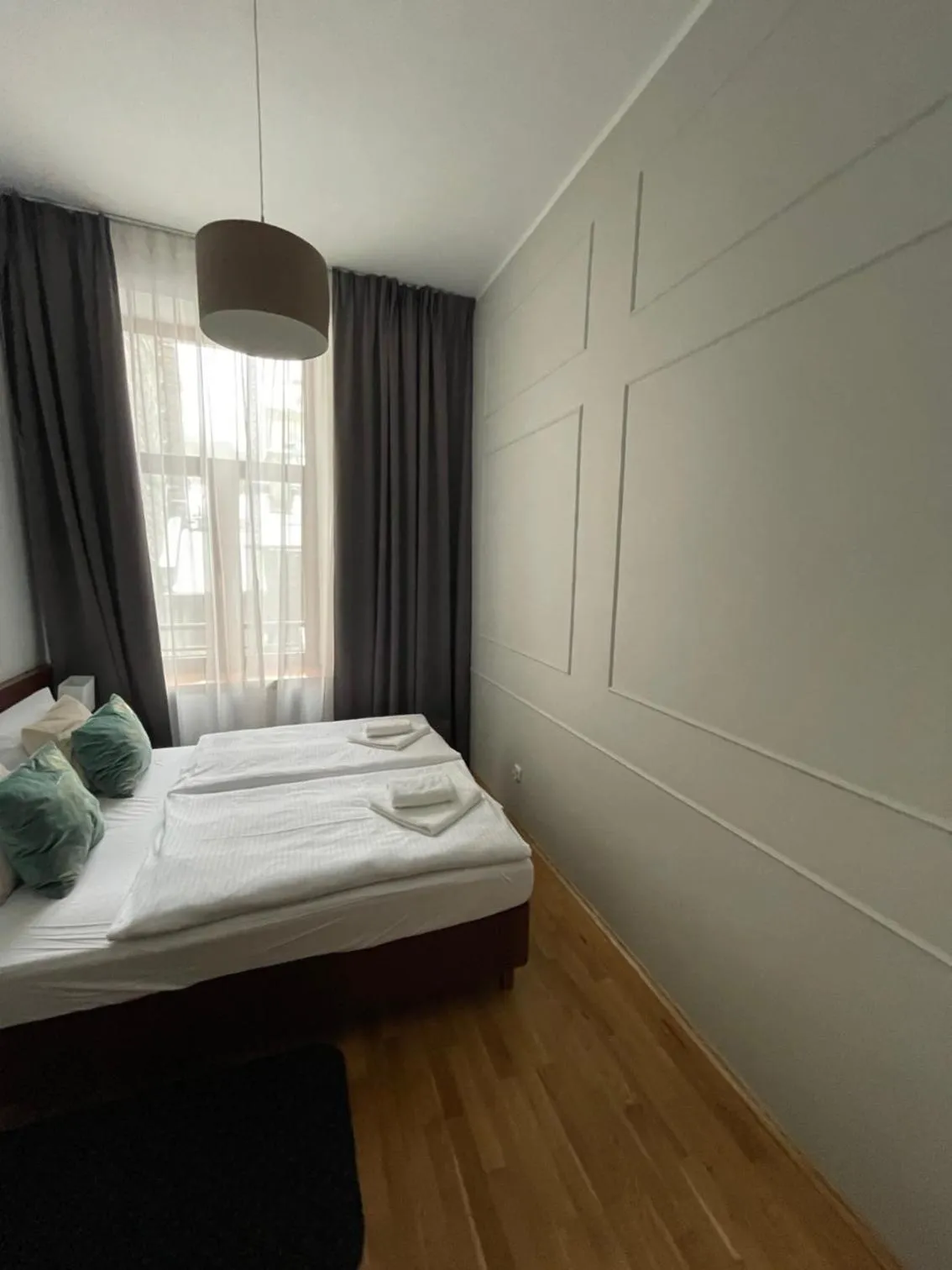 Bed in ON/SET APARTHOTEL