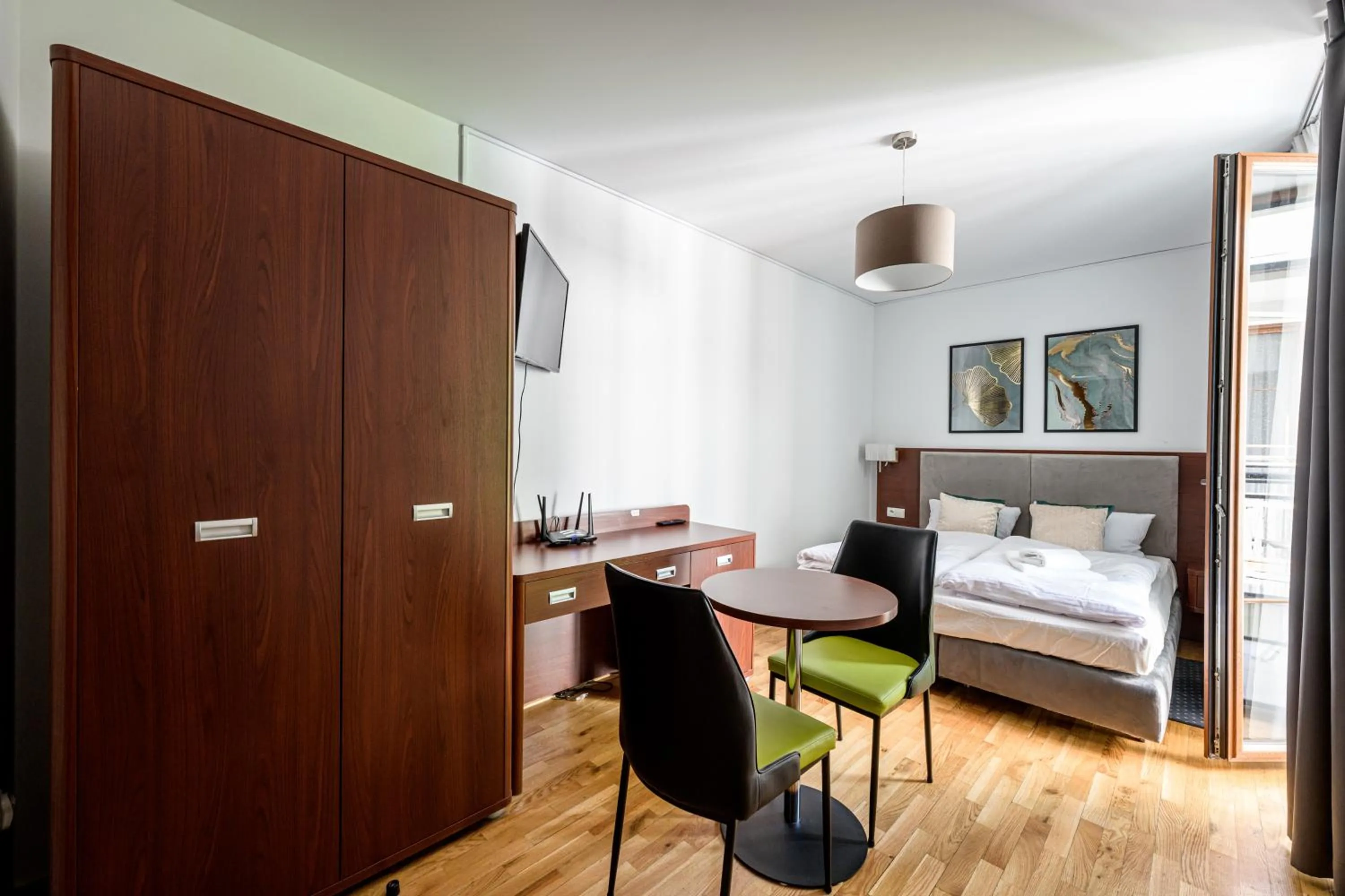 Bed in ON/SET APARTHOTEL