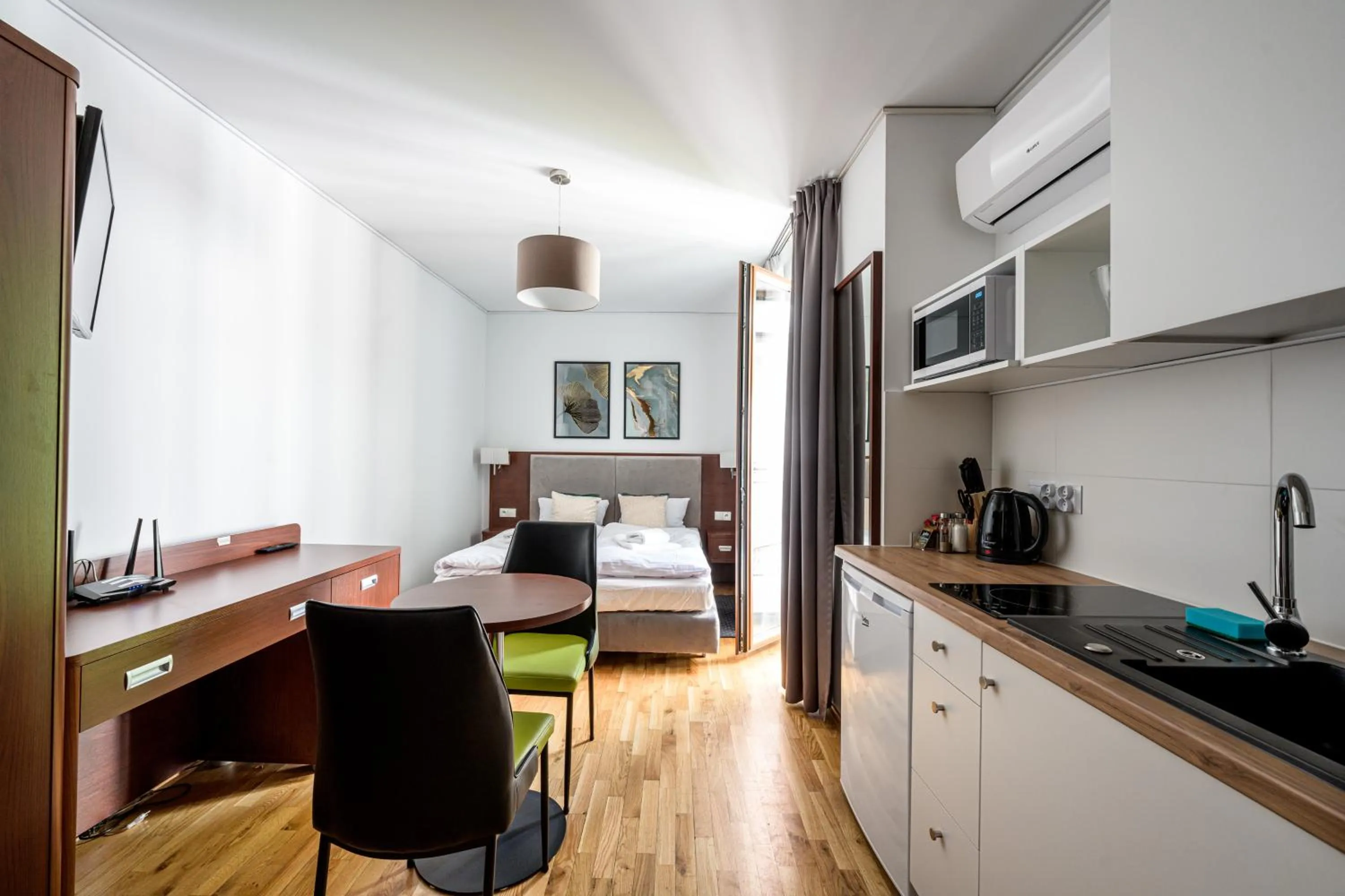 Bed in ON/SET APARTHOTEL