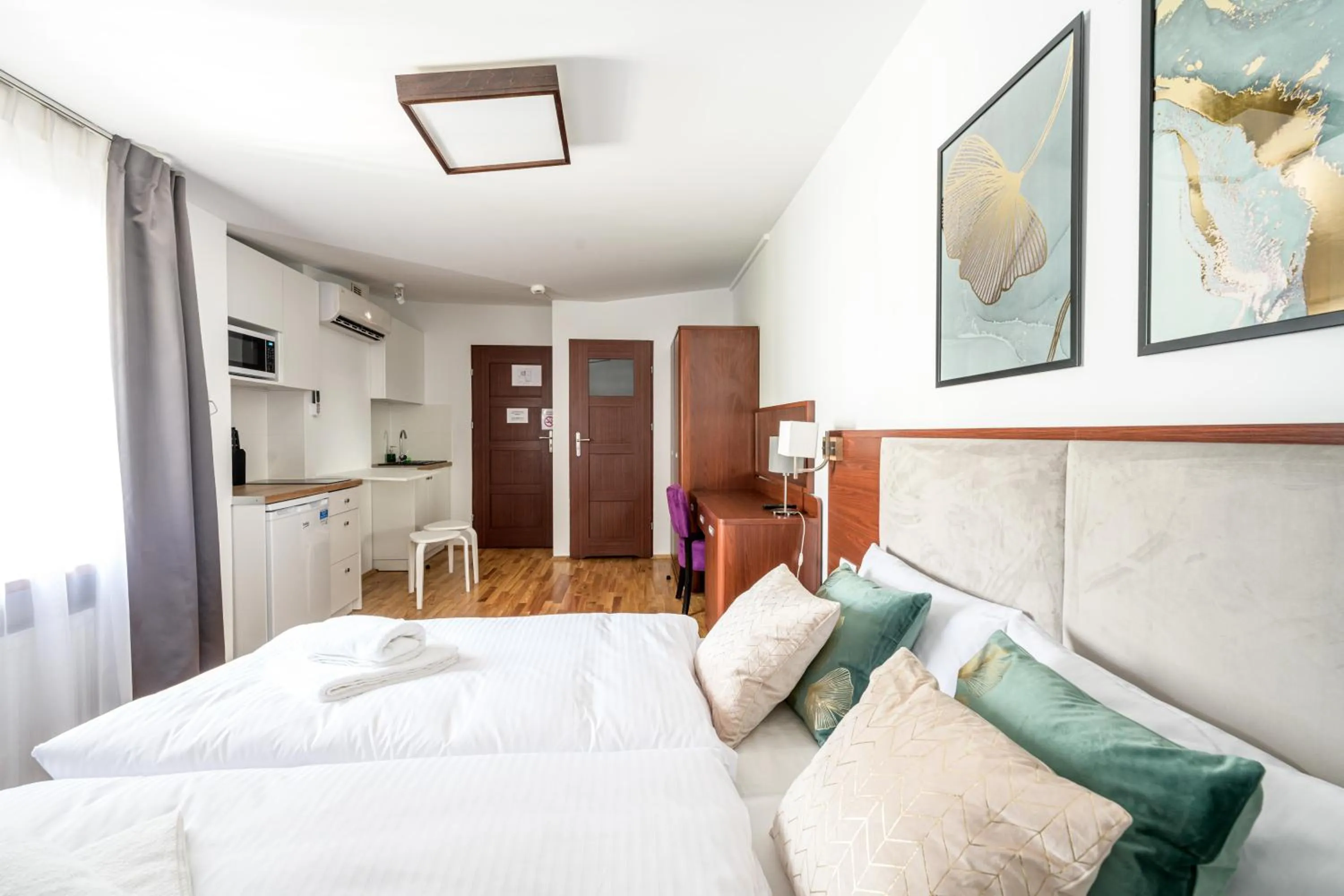 Bed in ON/SET APARTHOTEL