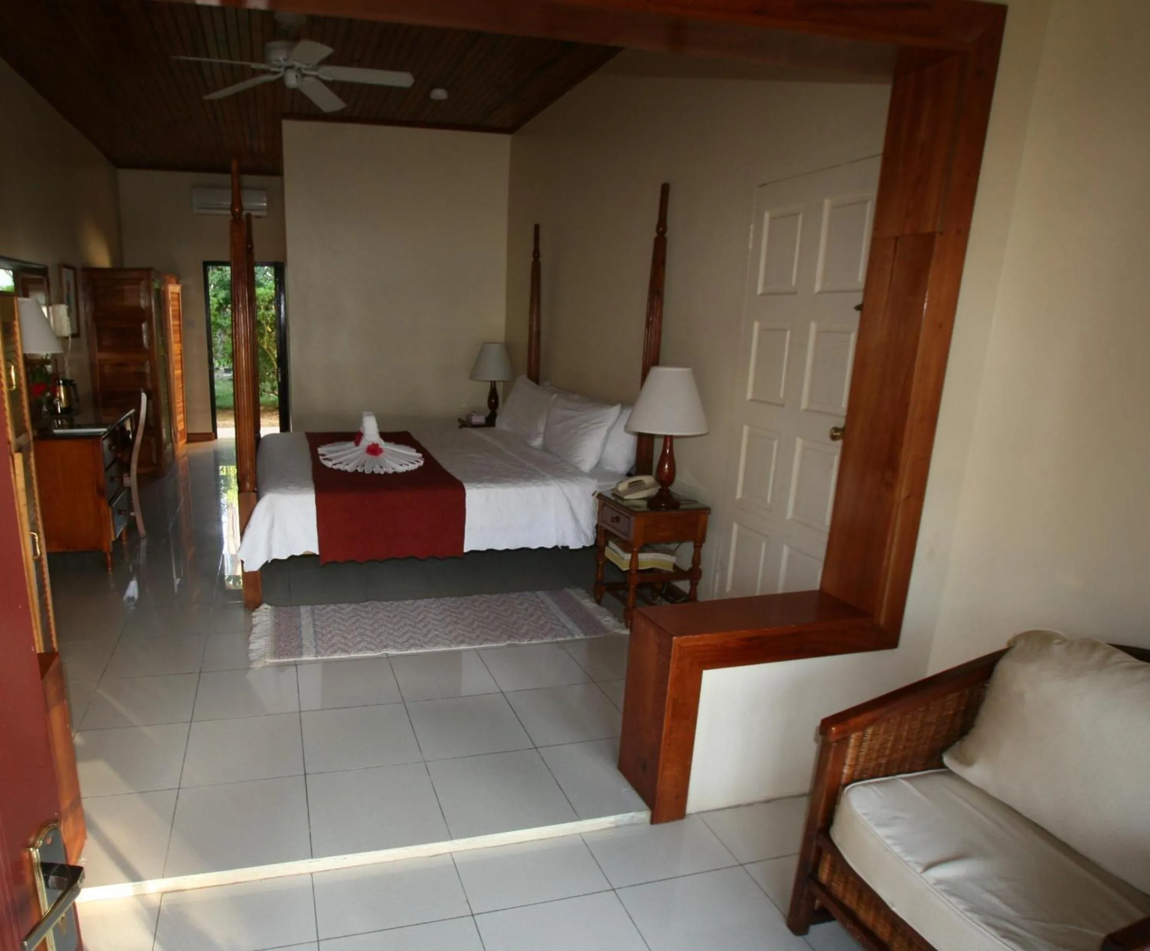 Photo of the whole room, Bed in Charela Inn