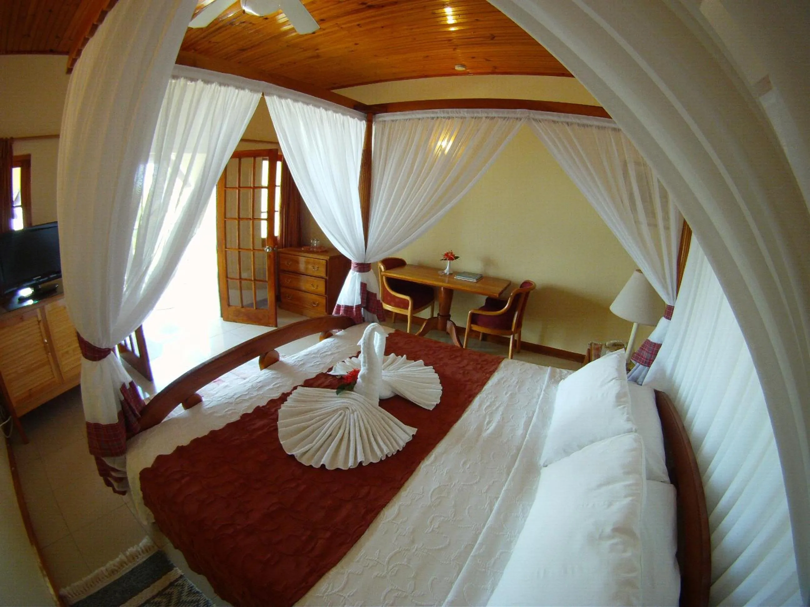 Bed in Charela Inn