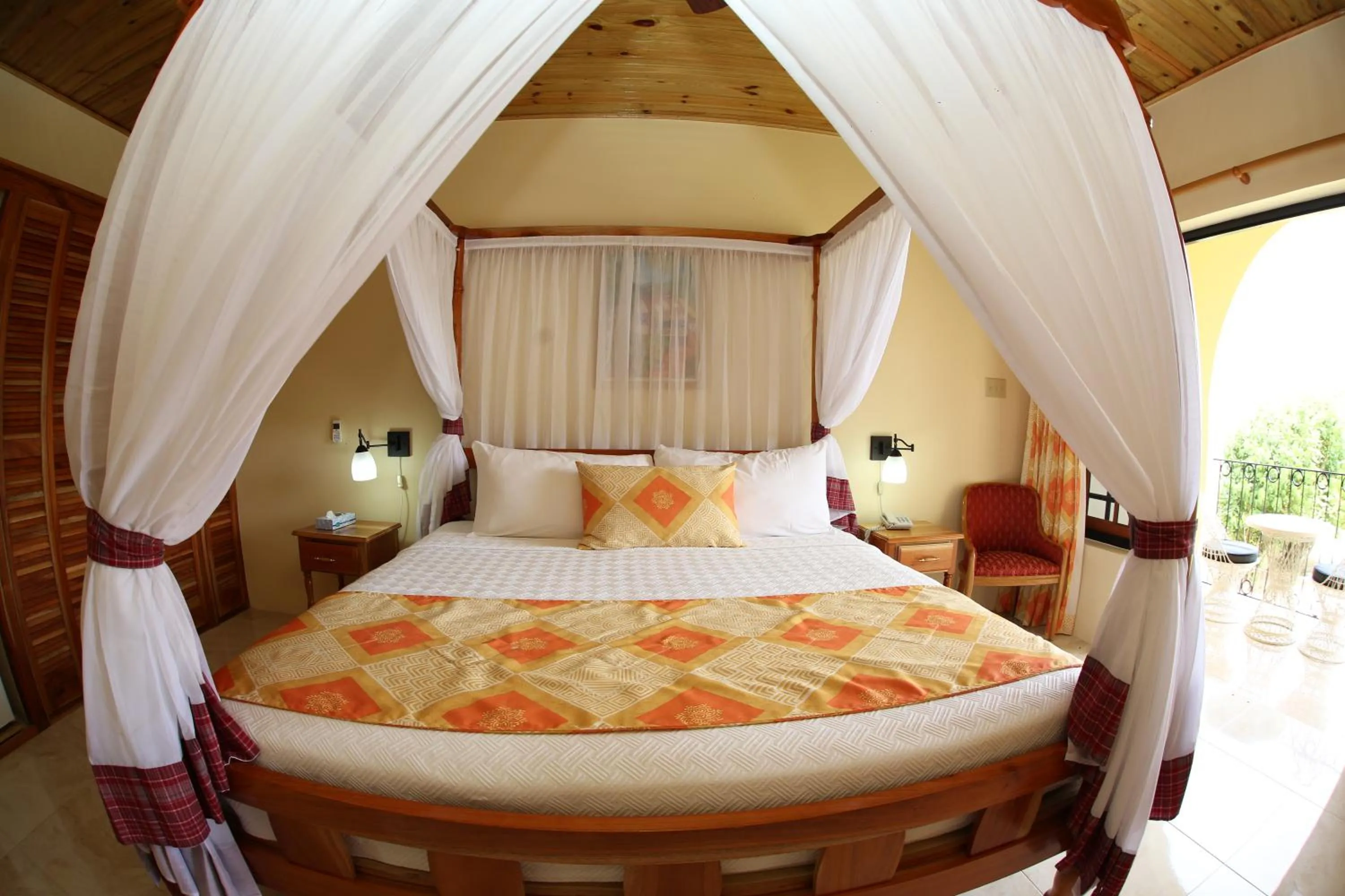 Bed in Charela Inn