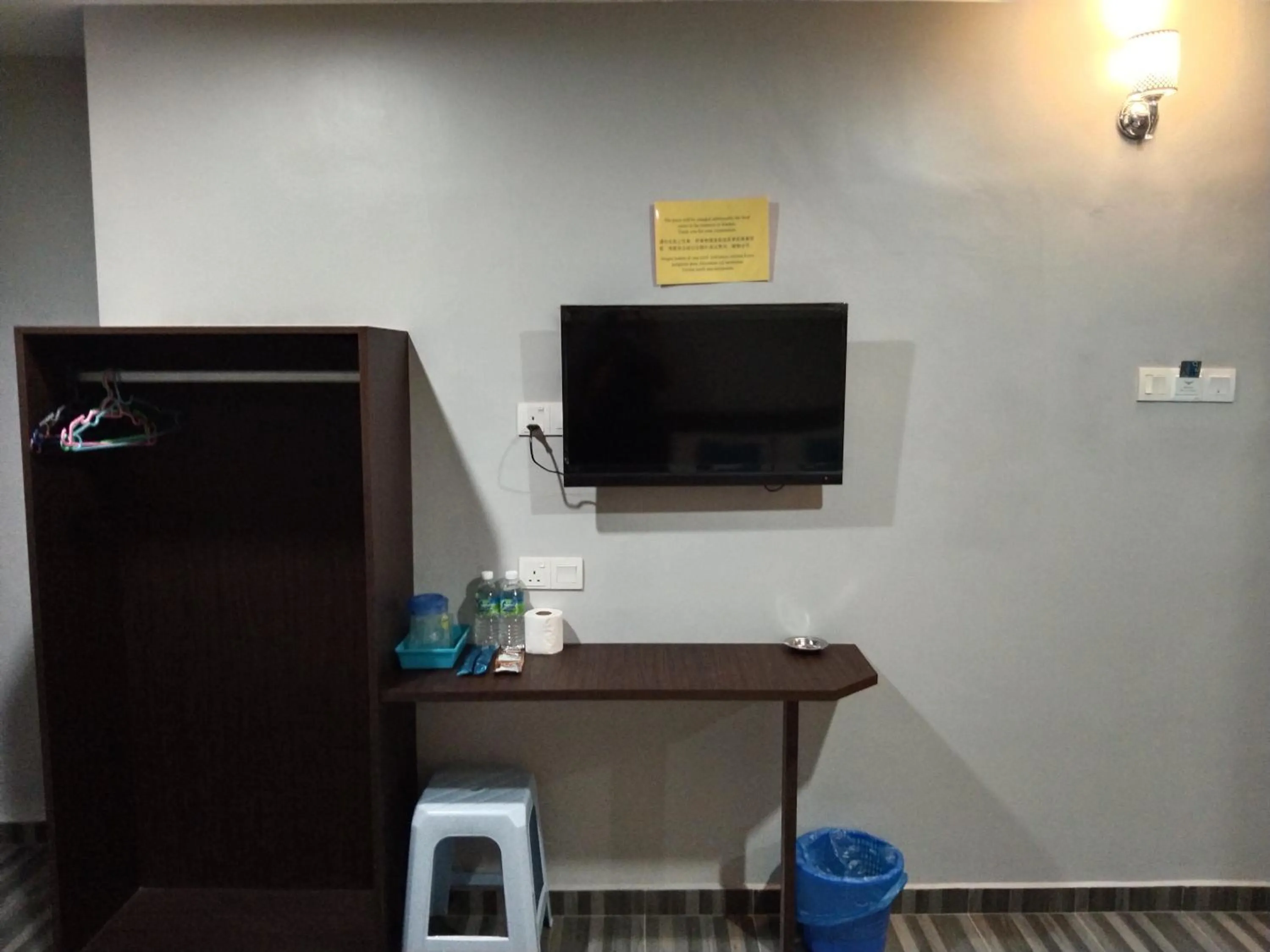 Communal lounge/ TV room in One World Hotel