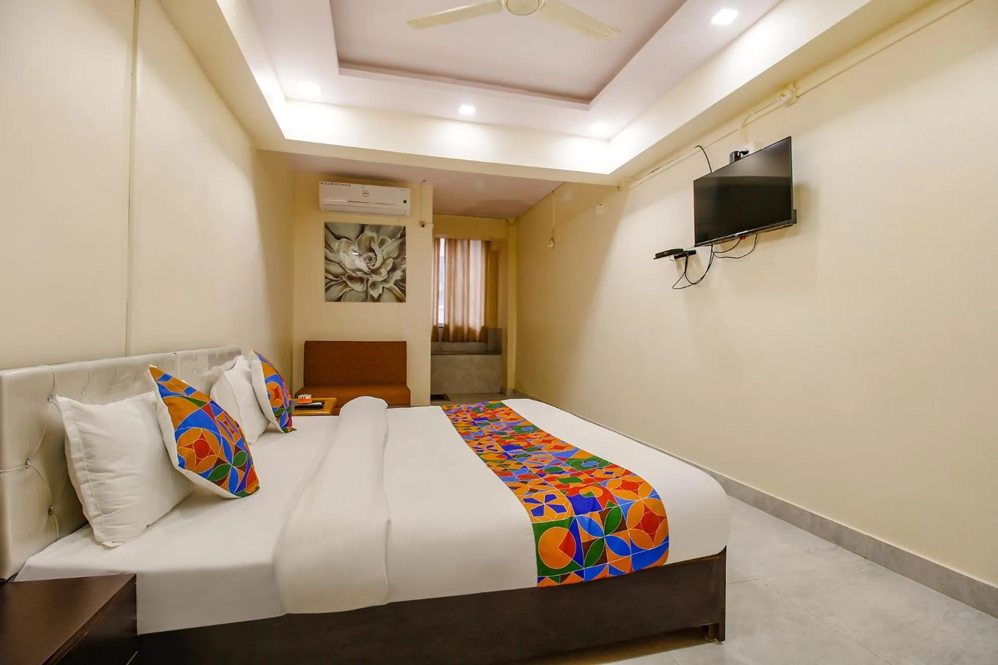 Bed in FabHotel Sanskar