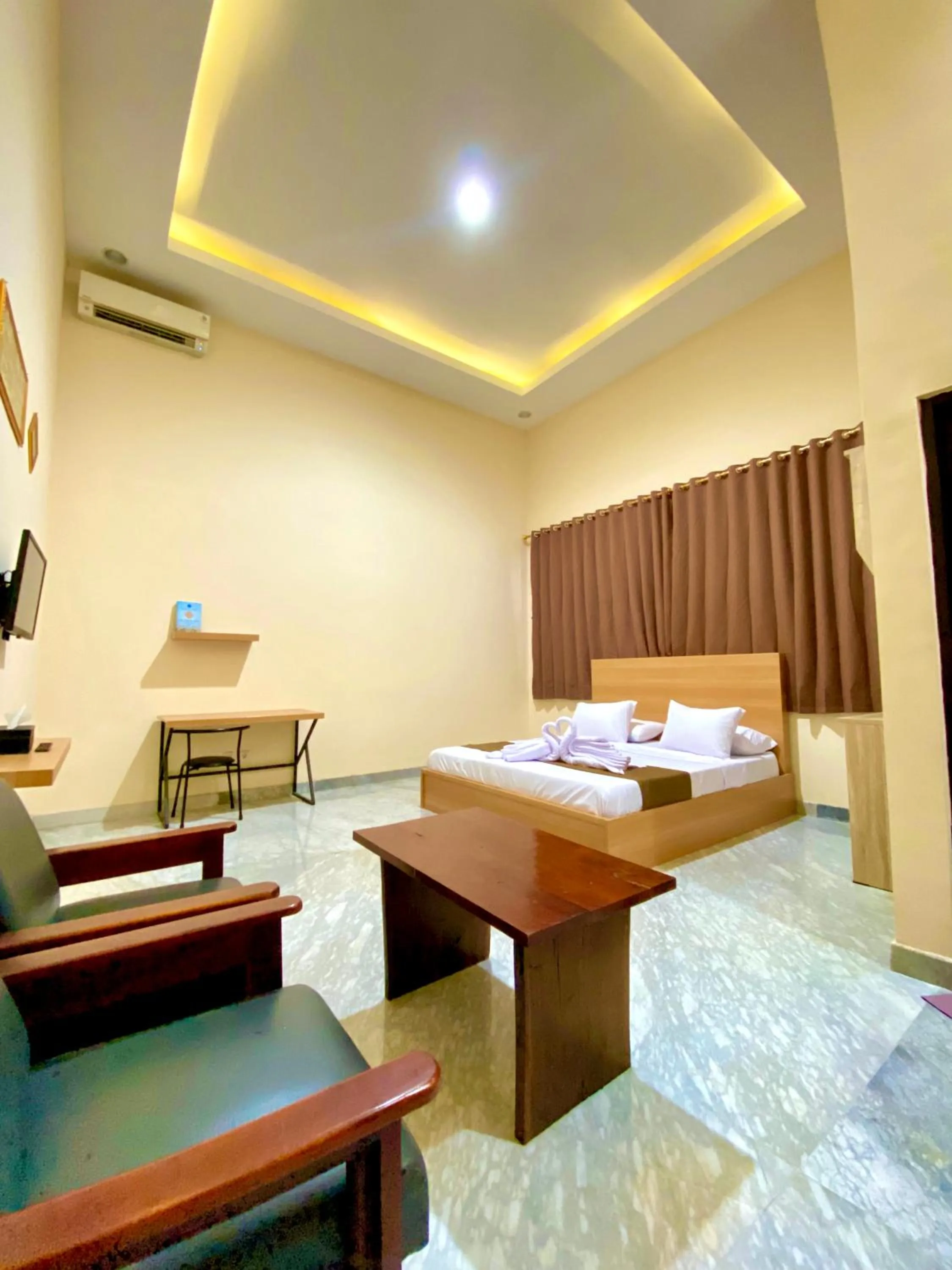 Bed in Al-Kiswah Syariah Guest House