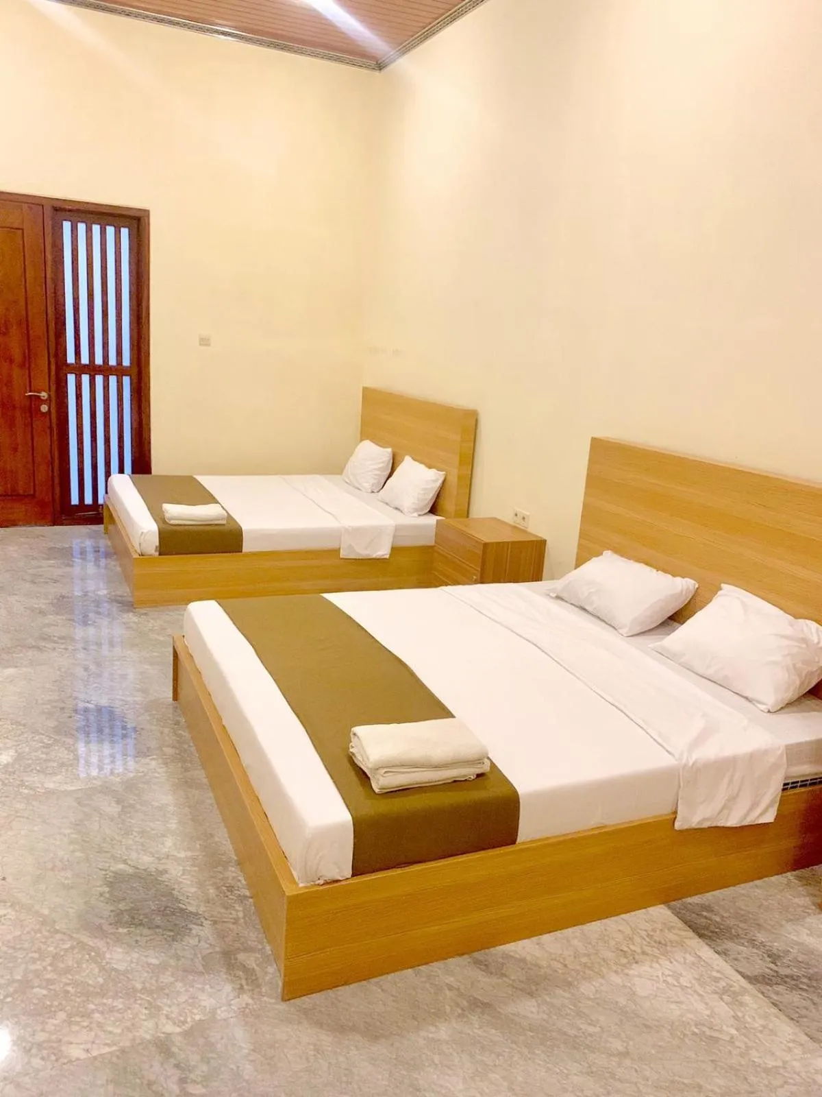 Bed in Al-Kiswah Syariah Guest House