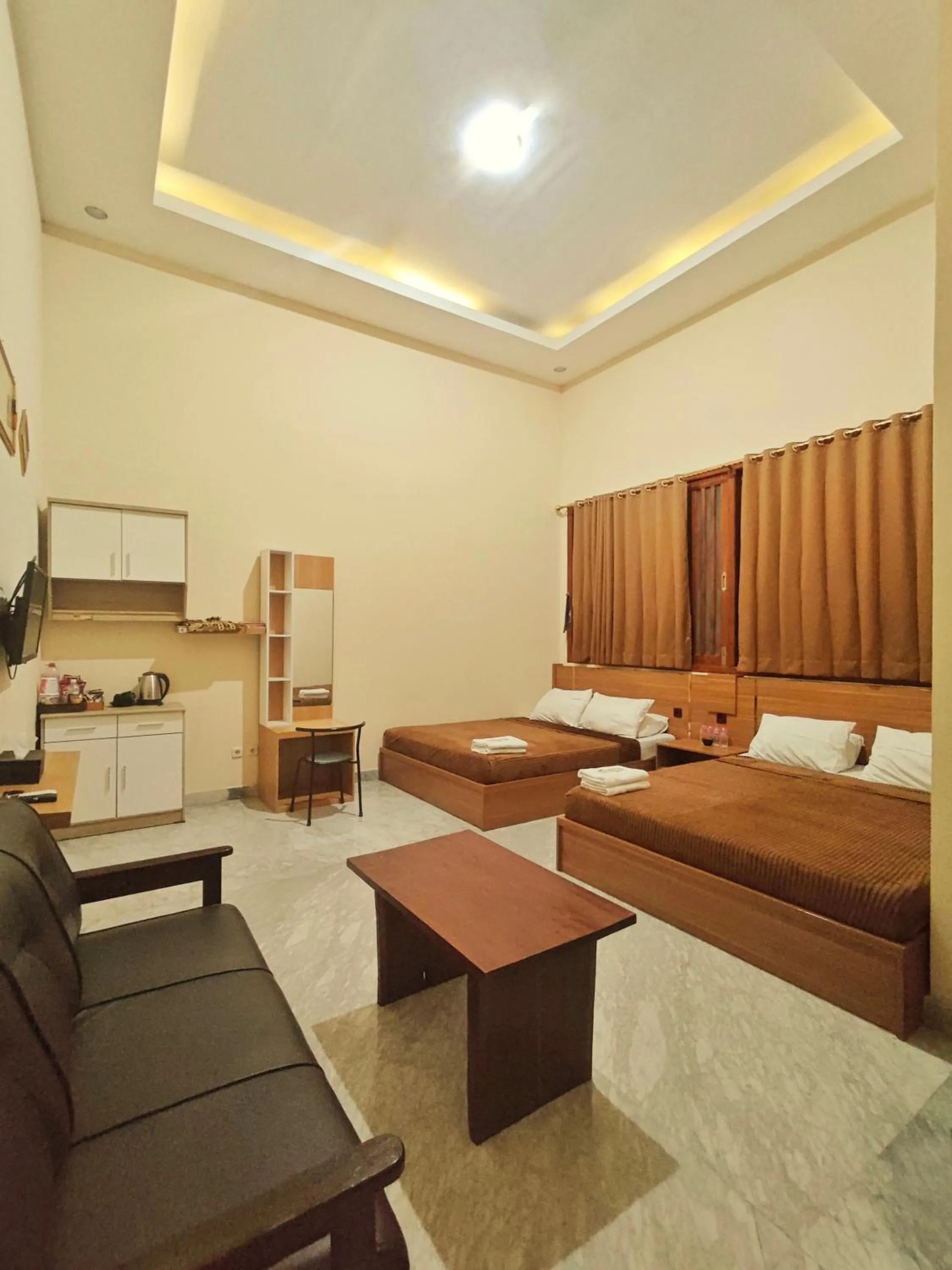 Bed in Al-Kiswah Syariah Guest House