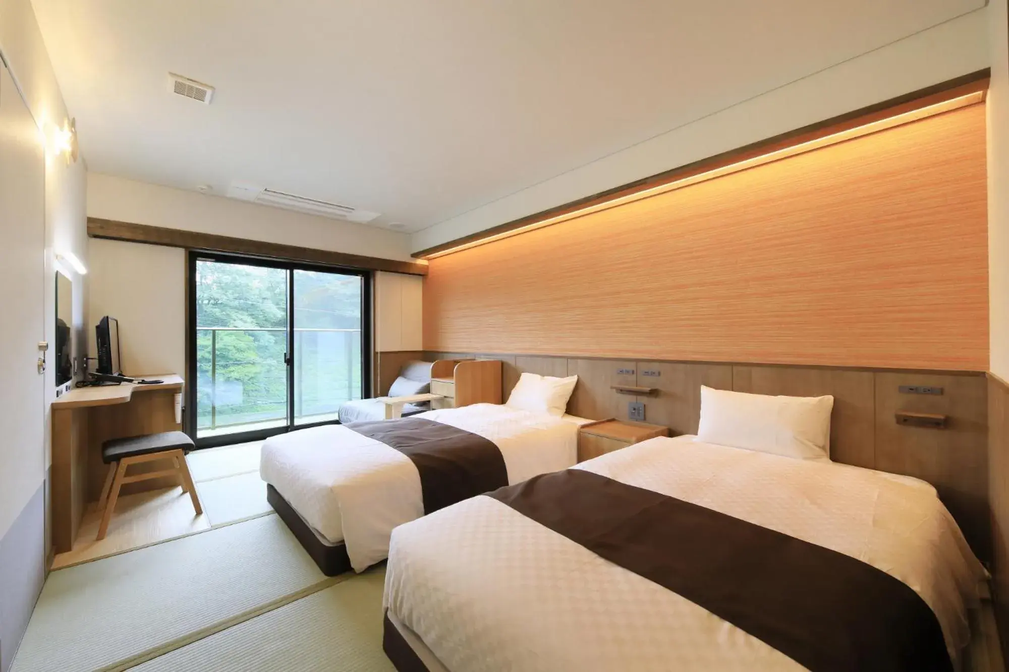 Bed in KusatsuOnsen AeruyadoTakamatsu Bed in KusatsuOnsen AeruyadoTakamatsu