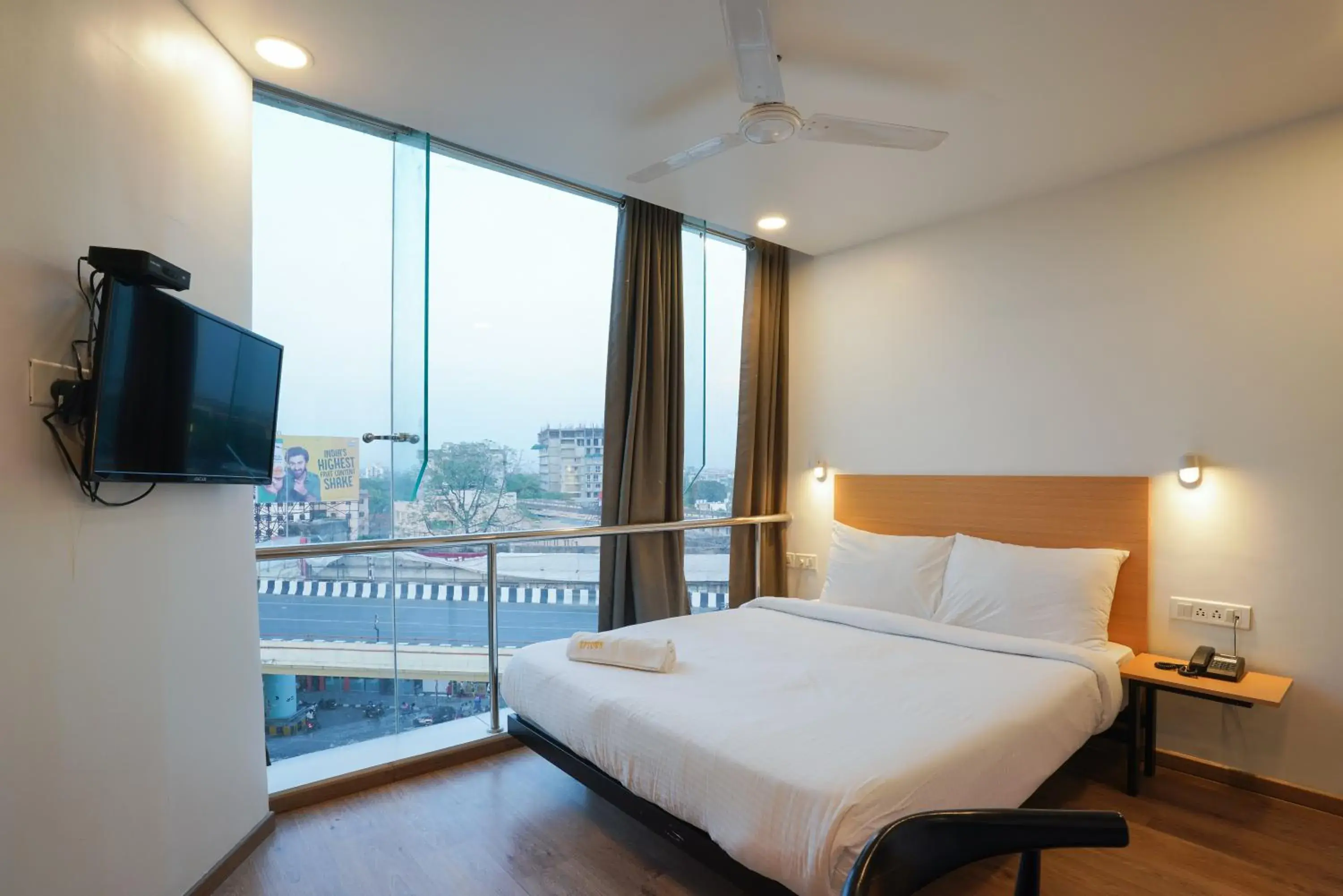 View (from property/room), Bed in Uptown Hotel View (from property/room), Bed in Uptown Hotel