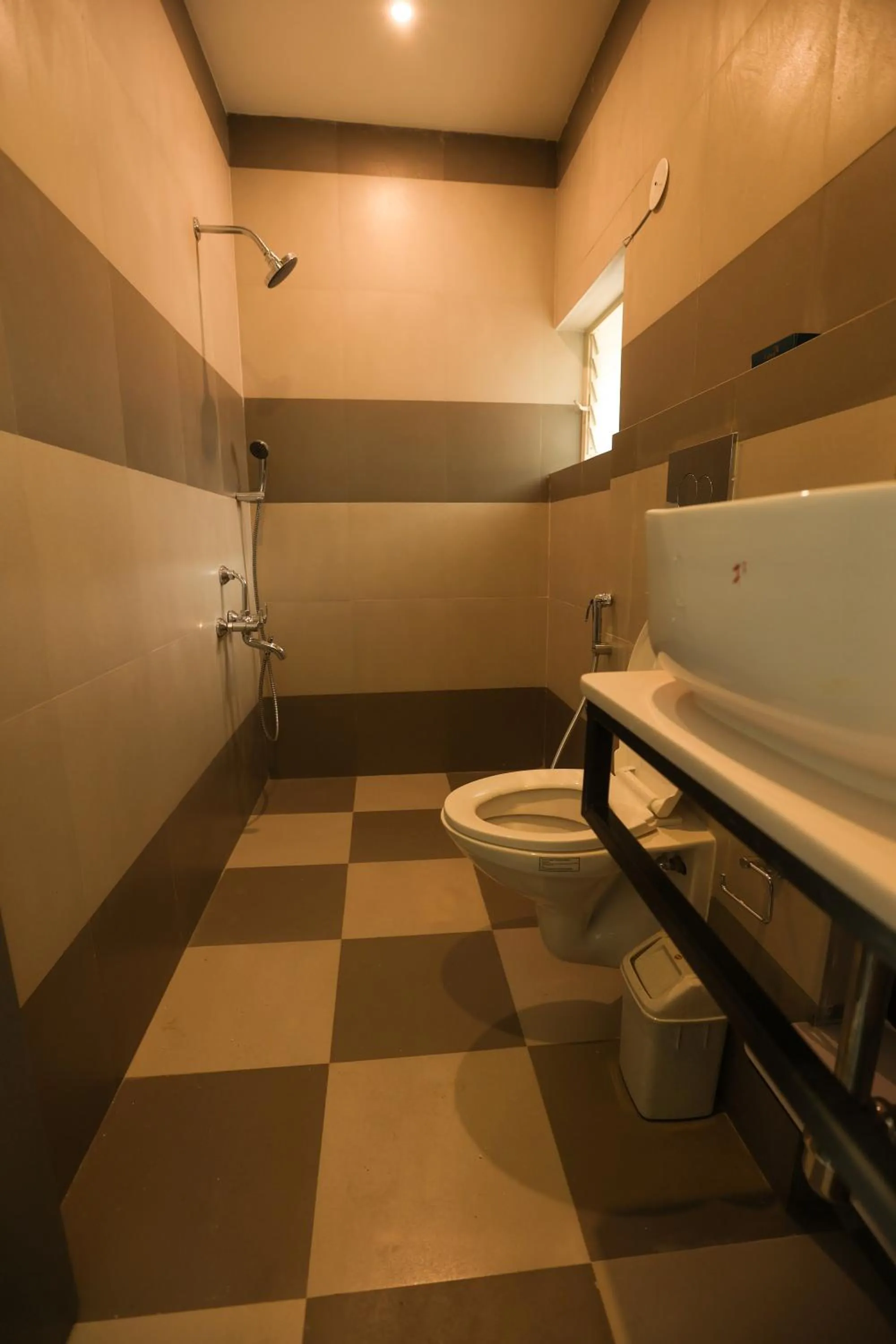 Bathroom in Coastal Pearl Hotel Miramar Panaji