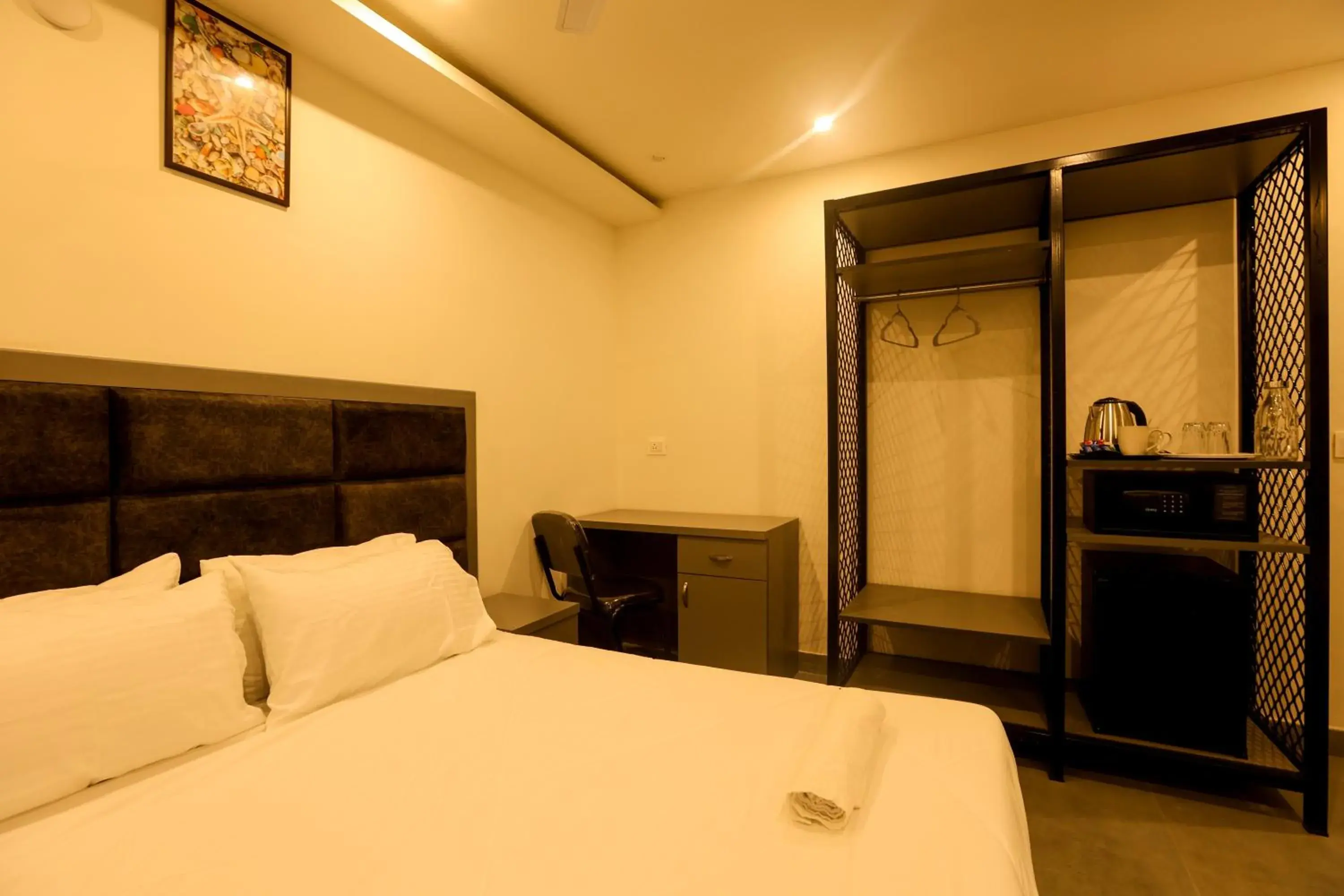 Photo of the whole room, Bed in Coastal Pearl Hotel Miramar Panaji Photo of the whole room, Bed in Coastal Pearl Hotel Miramar Panaji