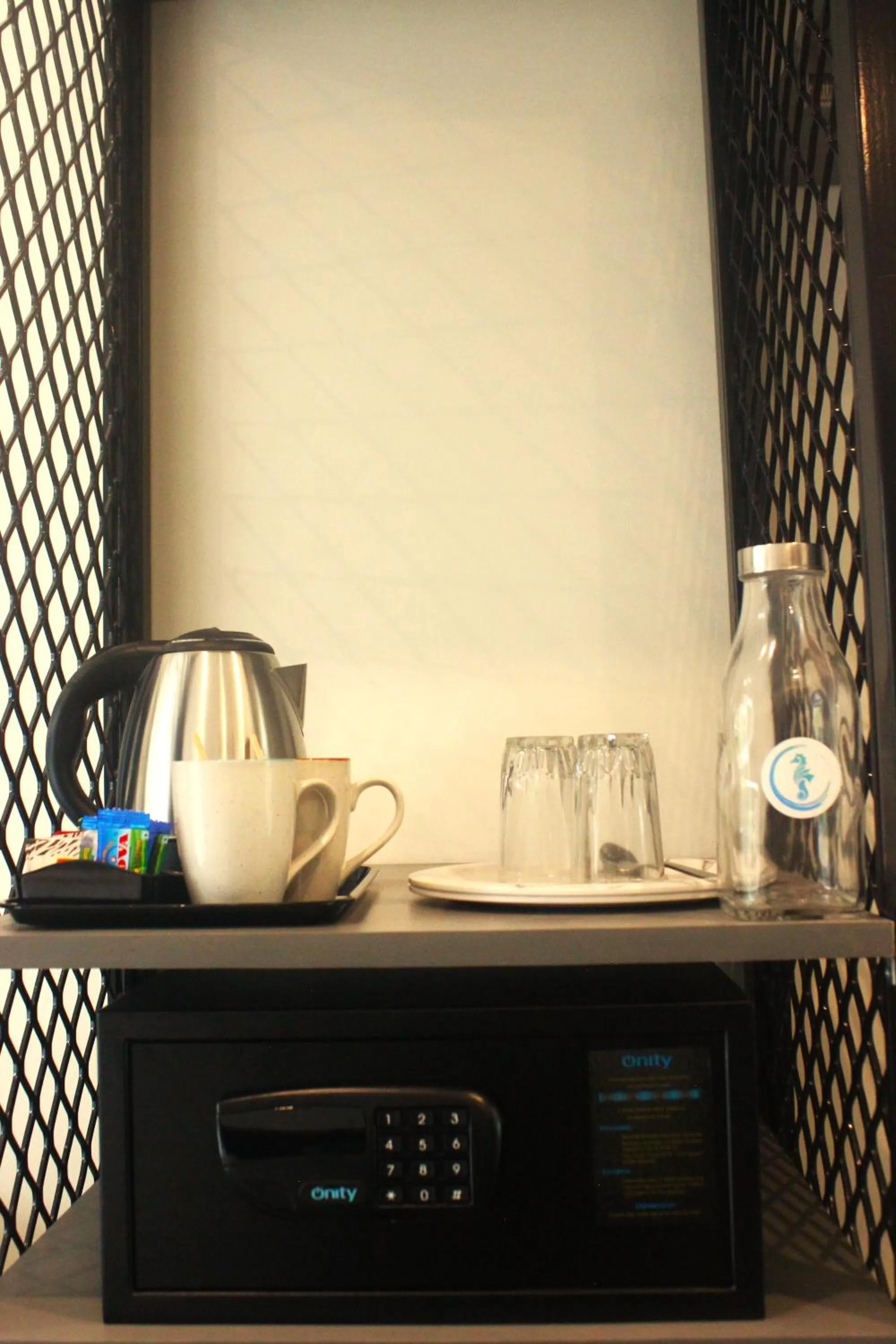 microwave in Coastal Pearl Hotel Miramar Panaji