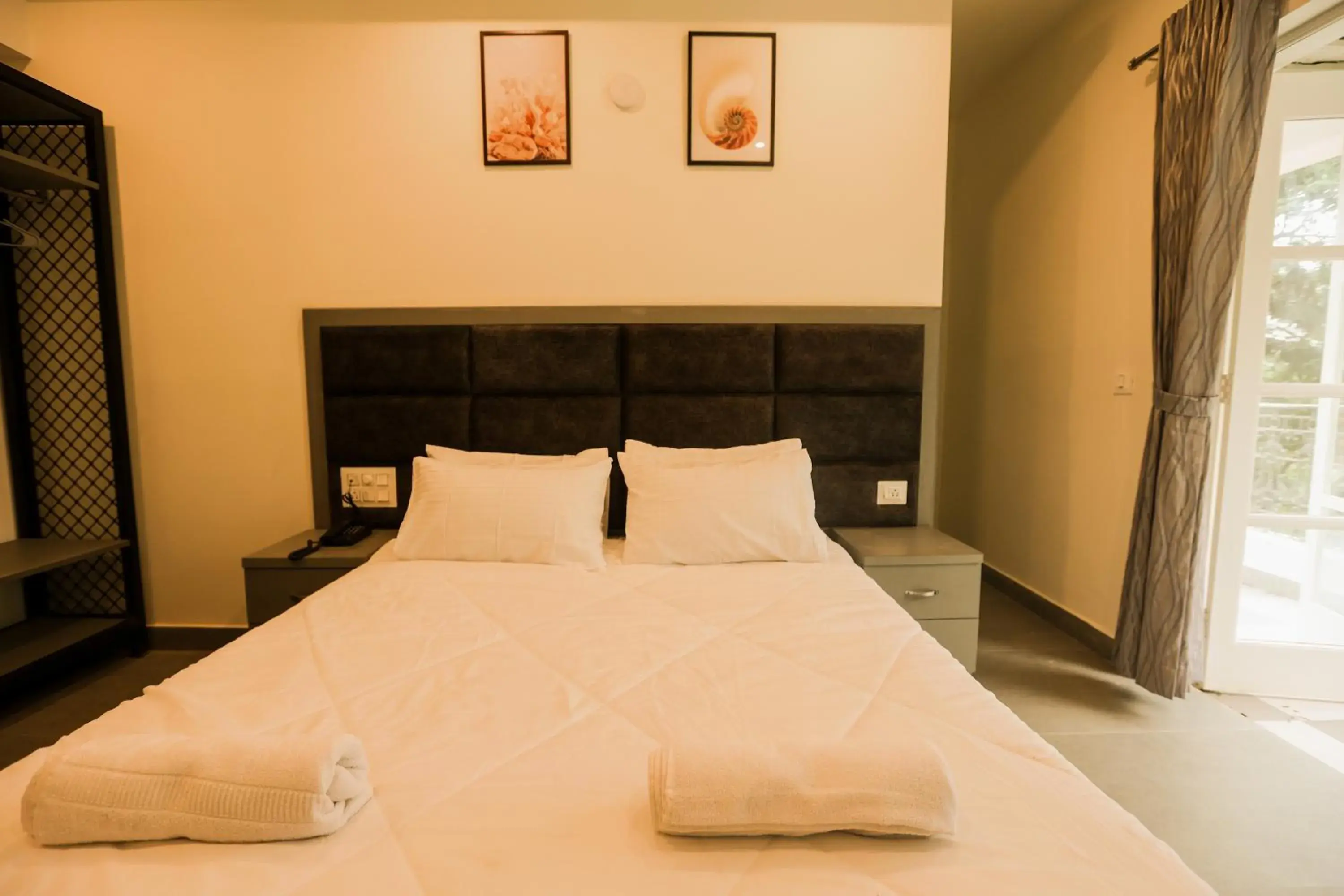 Photo of the whole room, Bed in Coastal Pearl Hotel Miramar Panaji Photo of the whole room, Bed in Coastal Pearl Hotel Miramar Panaji