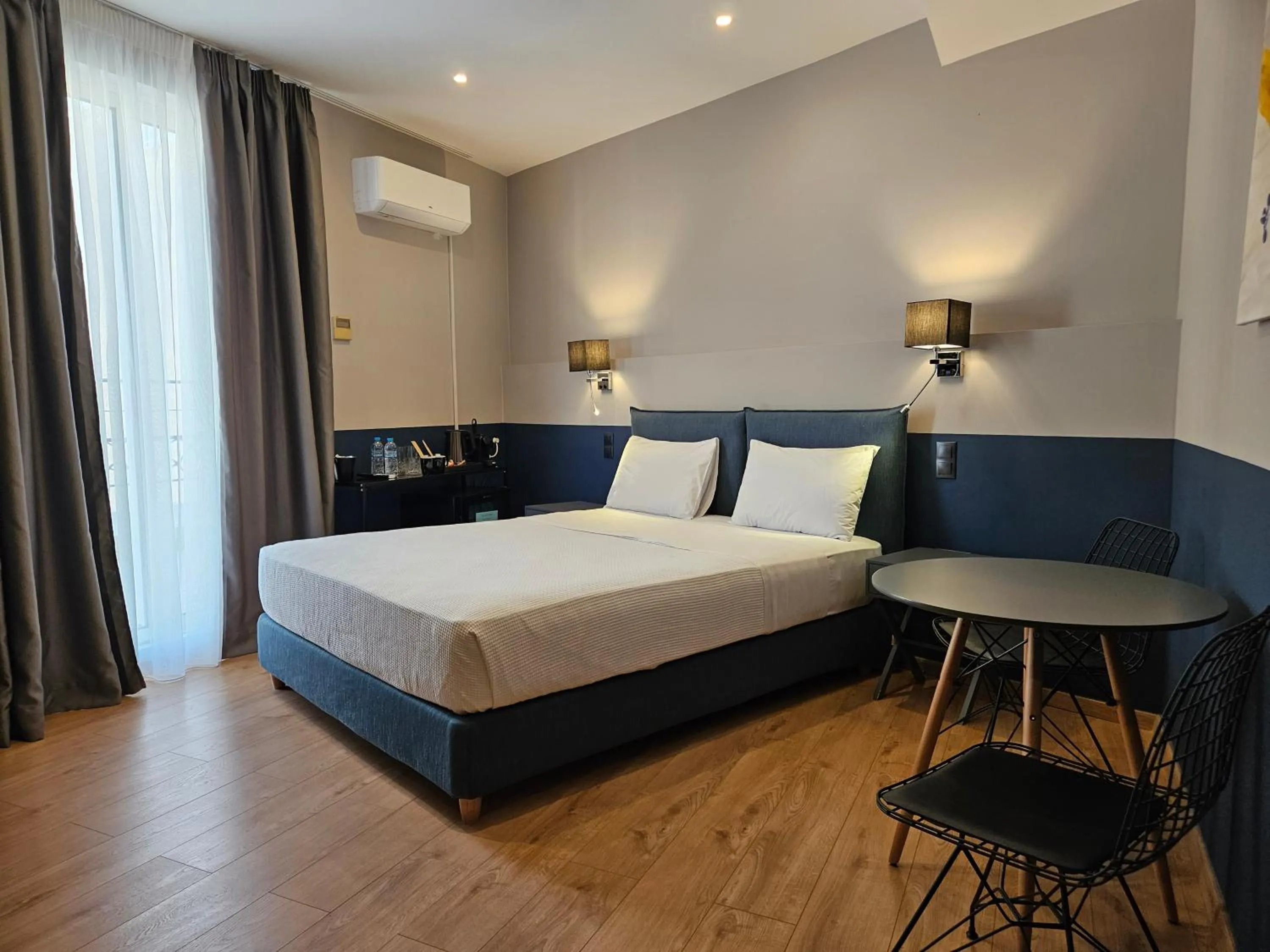 Photo of the whole room, Bed in The Vault Athens