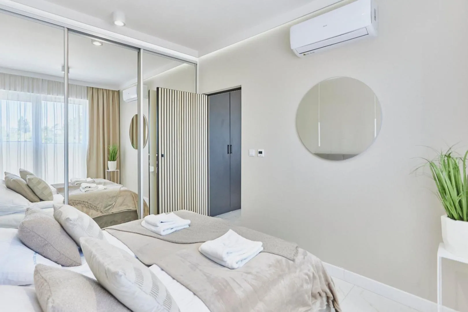Bed in Timber Apartments by Baltic Home