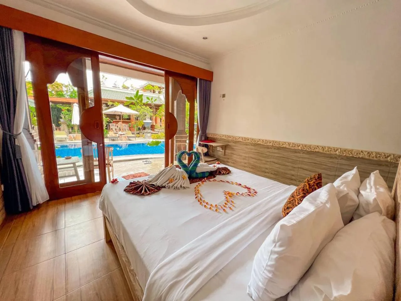 Bed in Mikuk Cottages Canggu