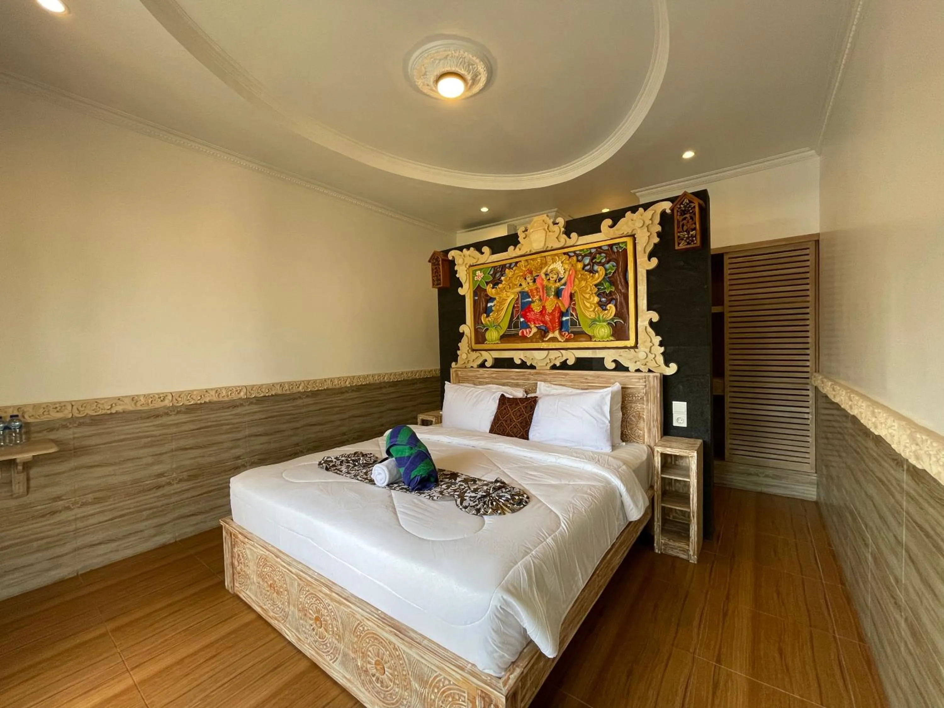Bed in Mikuk Cottages Canggu