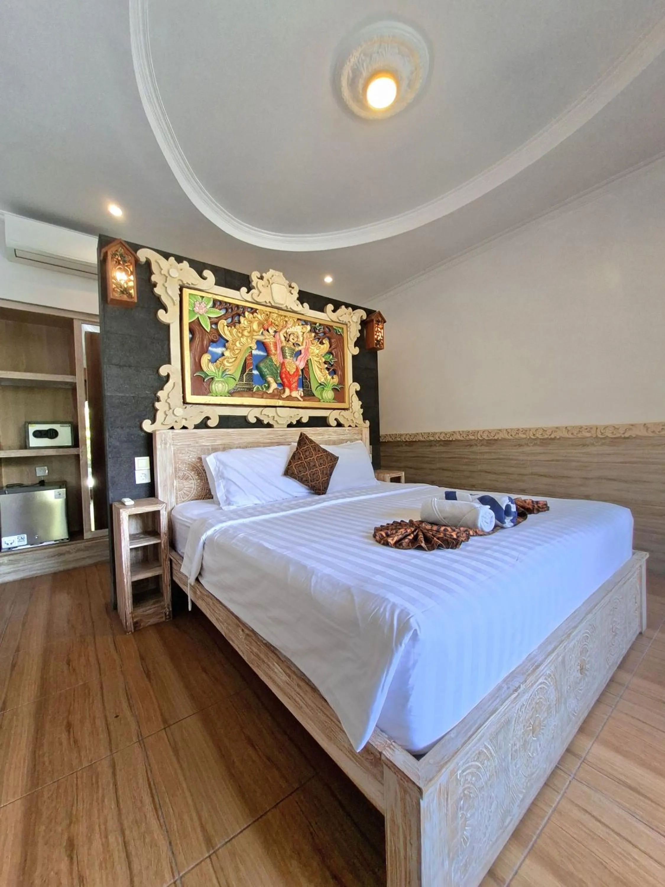 Bed in Mikuk Cottages Canggu