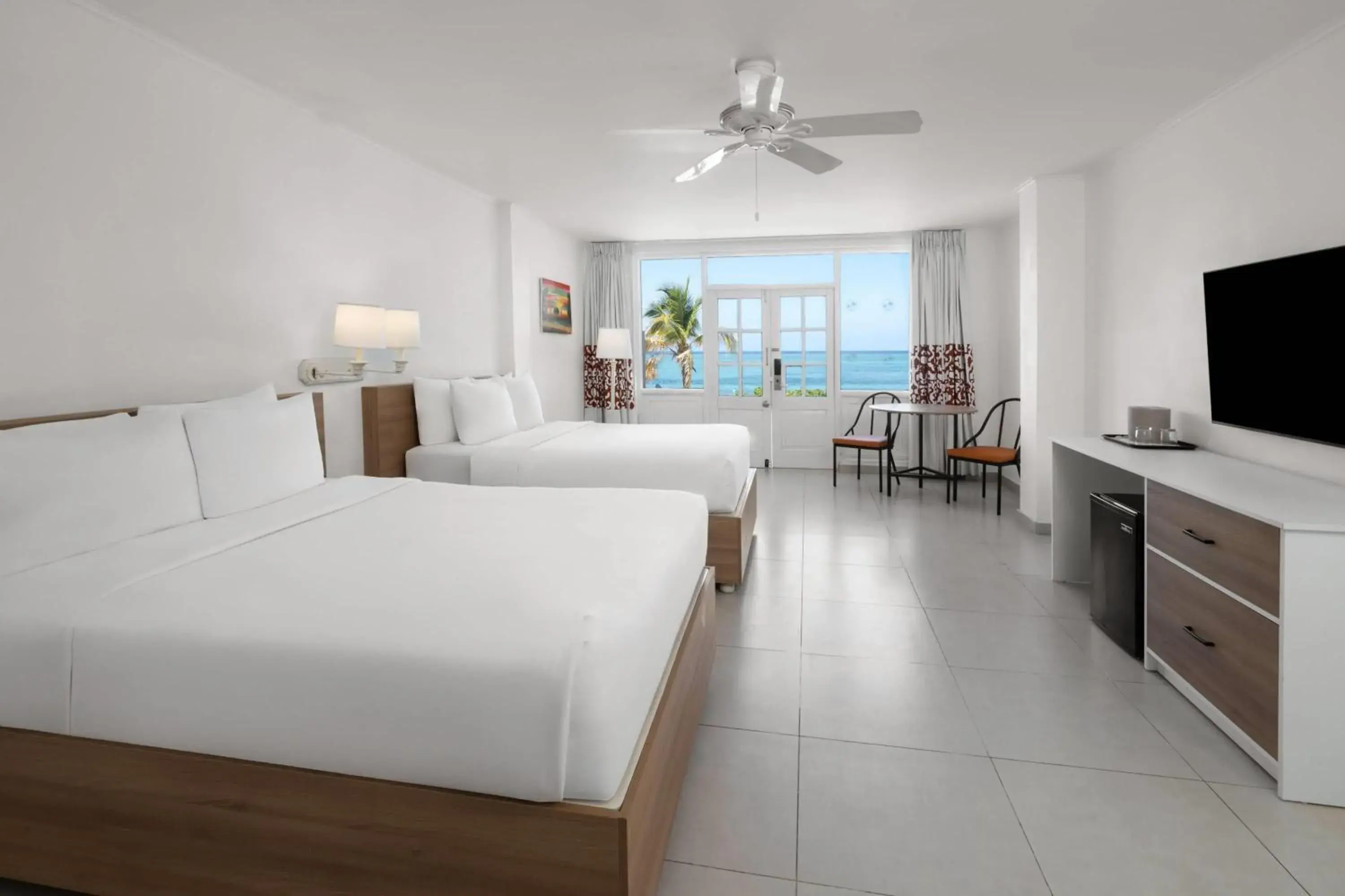 Bed in Grand Decameron Montego Beach, A Trademark All-Inclusive Resort Bed in Grand Decameron Montego Beach, A Trademark All-Inclusive Resort