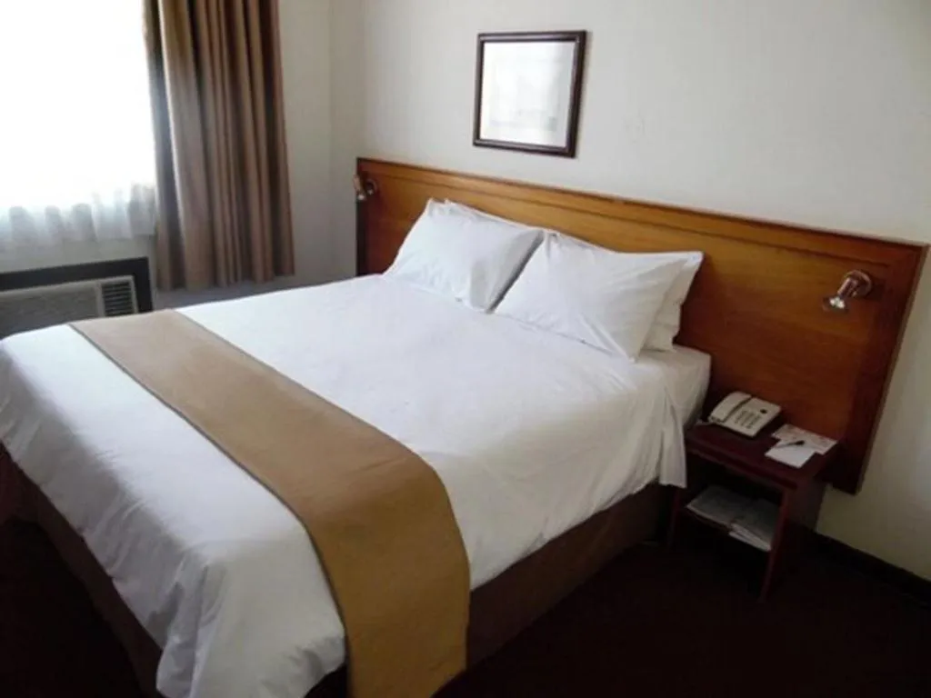 Bedroom in Arcadia Hotel