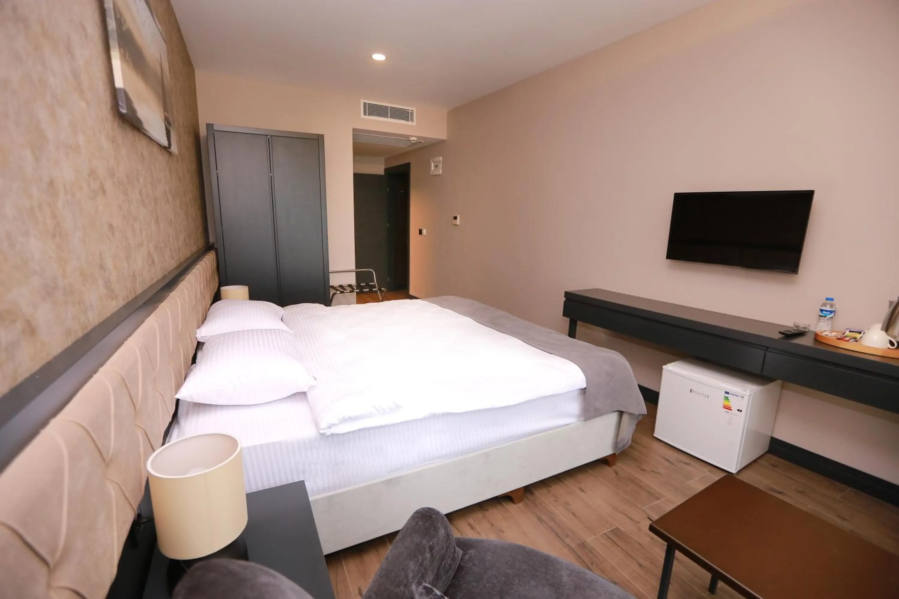 Bed in PENTAHOR HOTEL