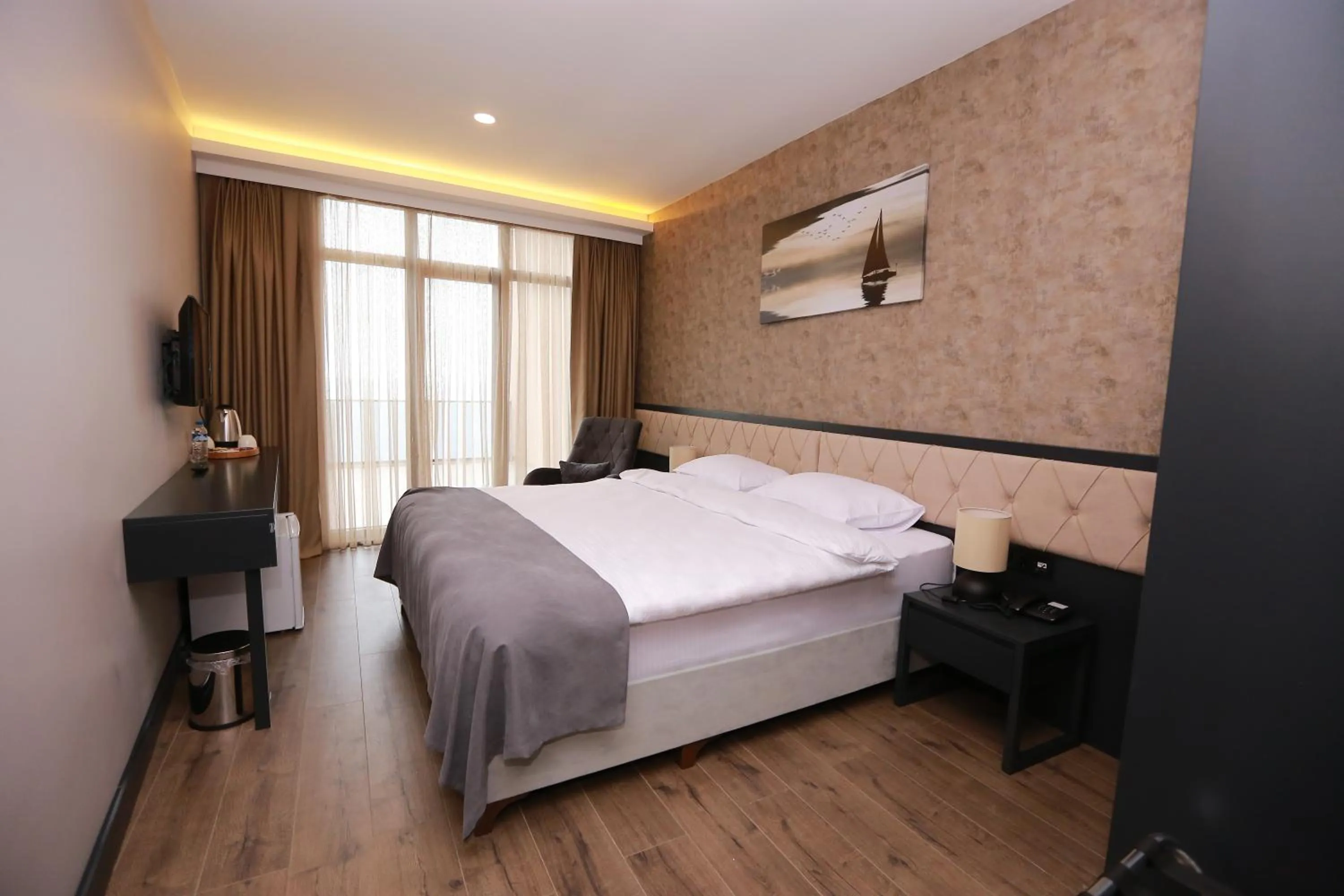 Bed in PENTAHOR HOTEL