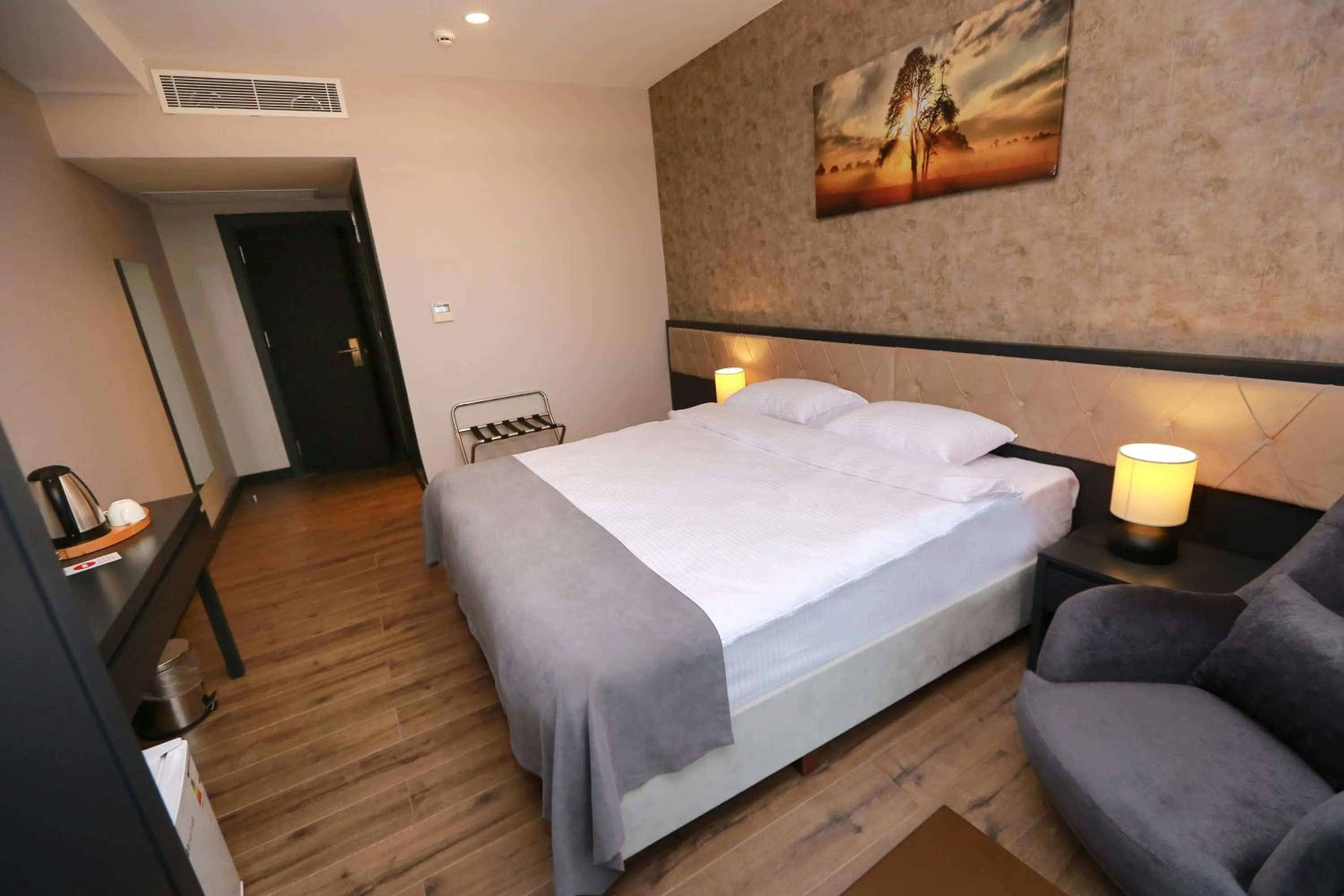 Bed in PENTAHOR HOTEL