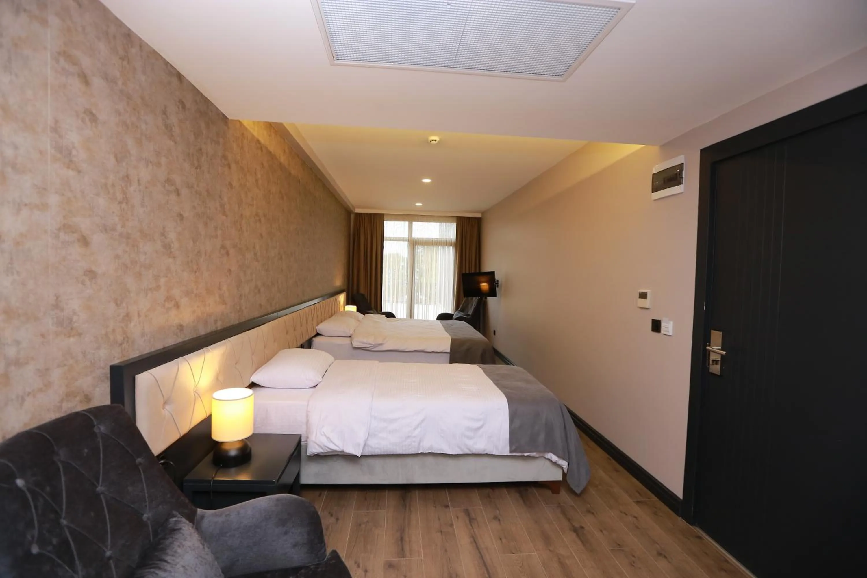 Bed in PENTAHOR HOTEL