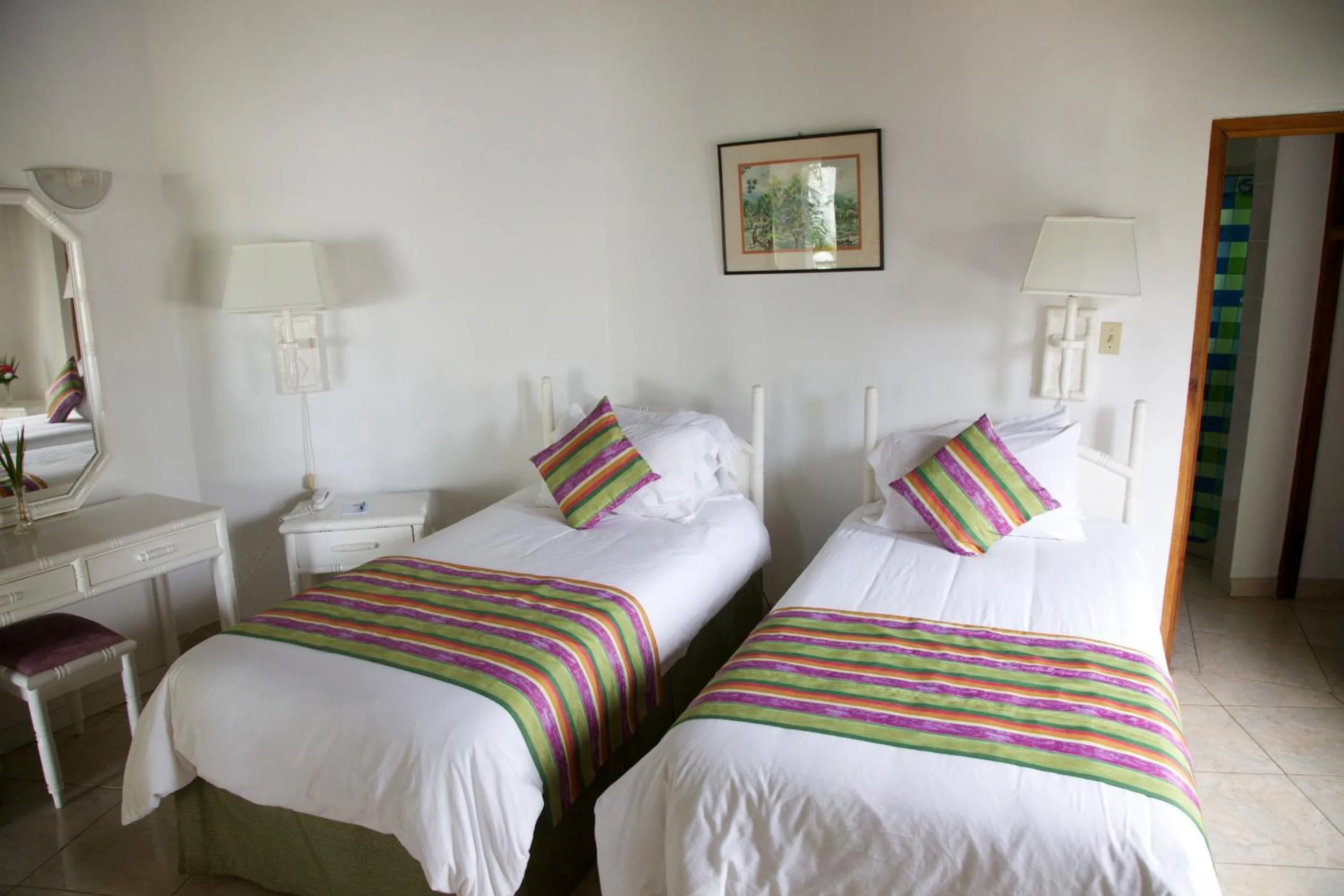 Bed in Negril Treehouse Resort