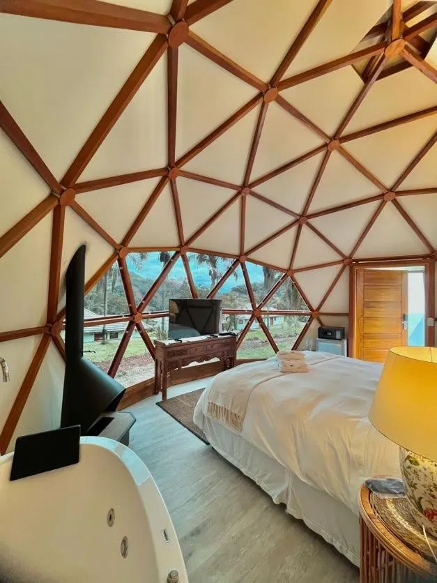 Bed in Embaúba Boutique Hotel