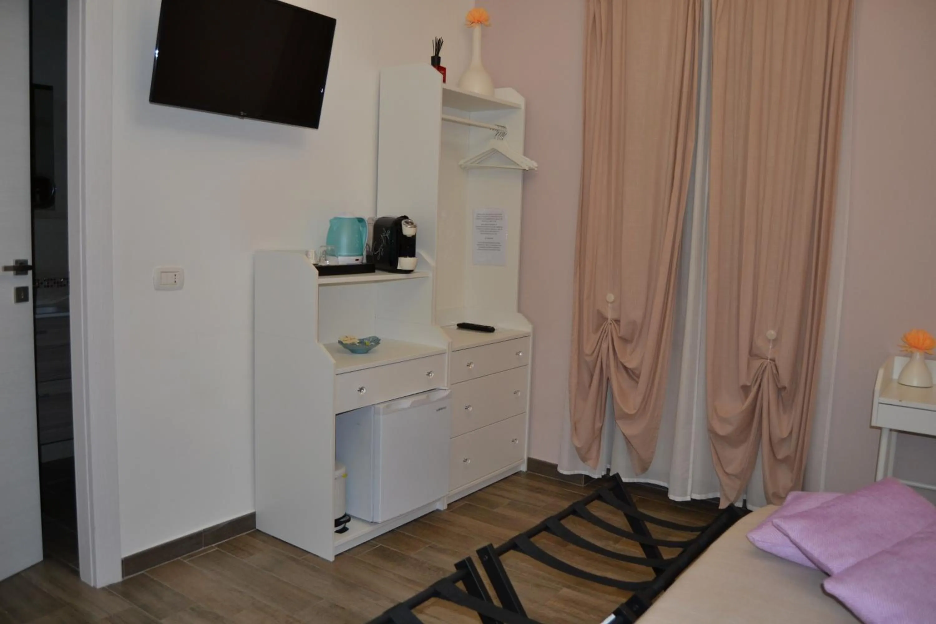 Photo of the whole room, TV/Entertainment Center in Karina's Rooms