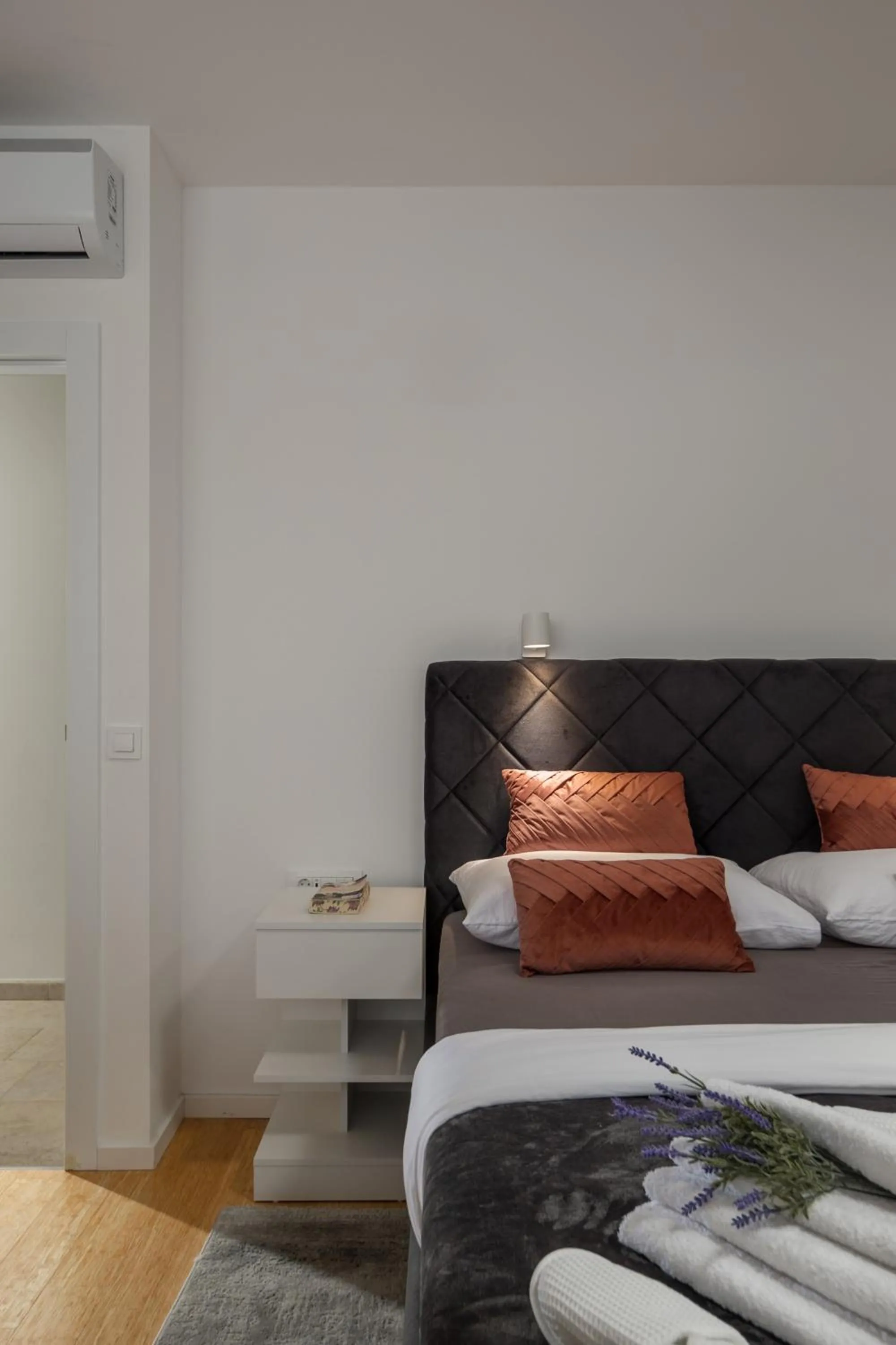 Bed in Luxury apartment Marco Polo with a private swimming pool with salt sea water