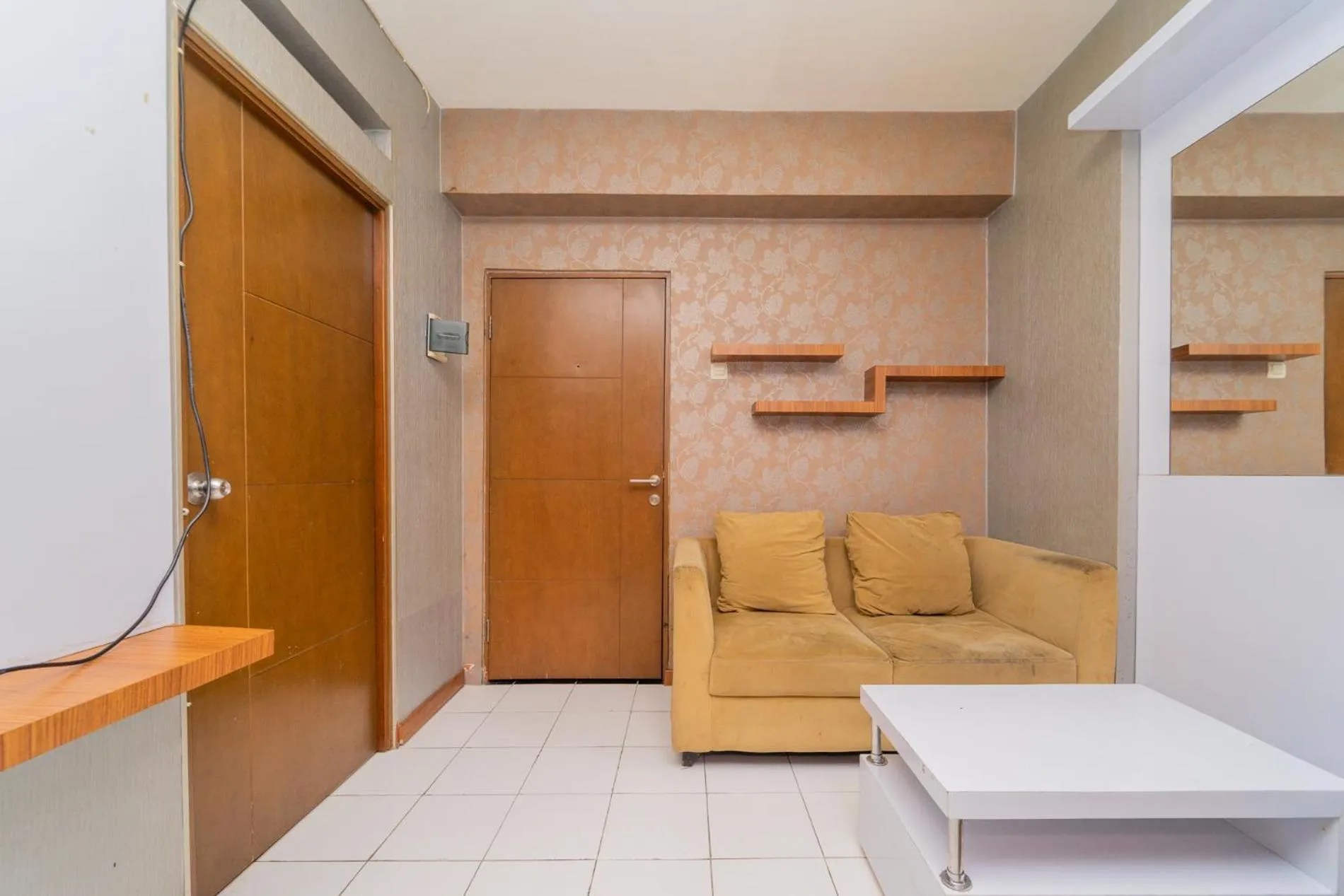 Living room in RedLiving Apartemen Gateway Cicadas - DB Room