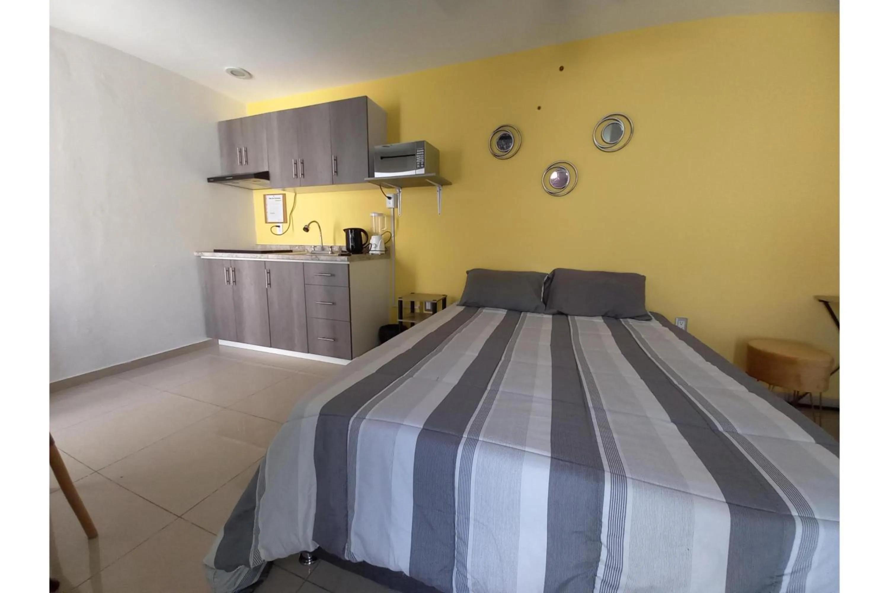 Bedroom, Bed in Capital O Tu Estancia