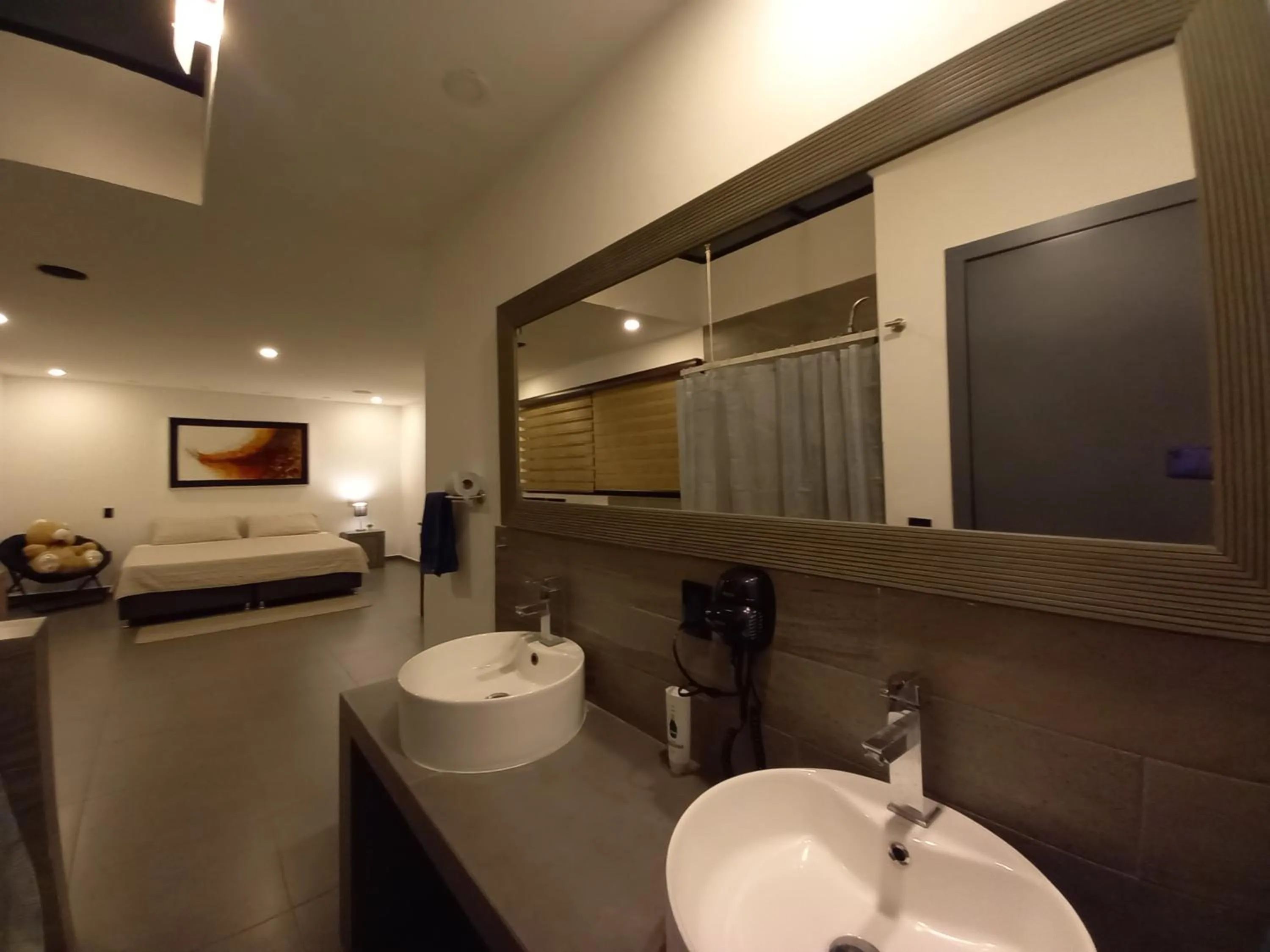 Toilet in Capital O Tu Estancia