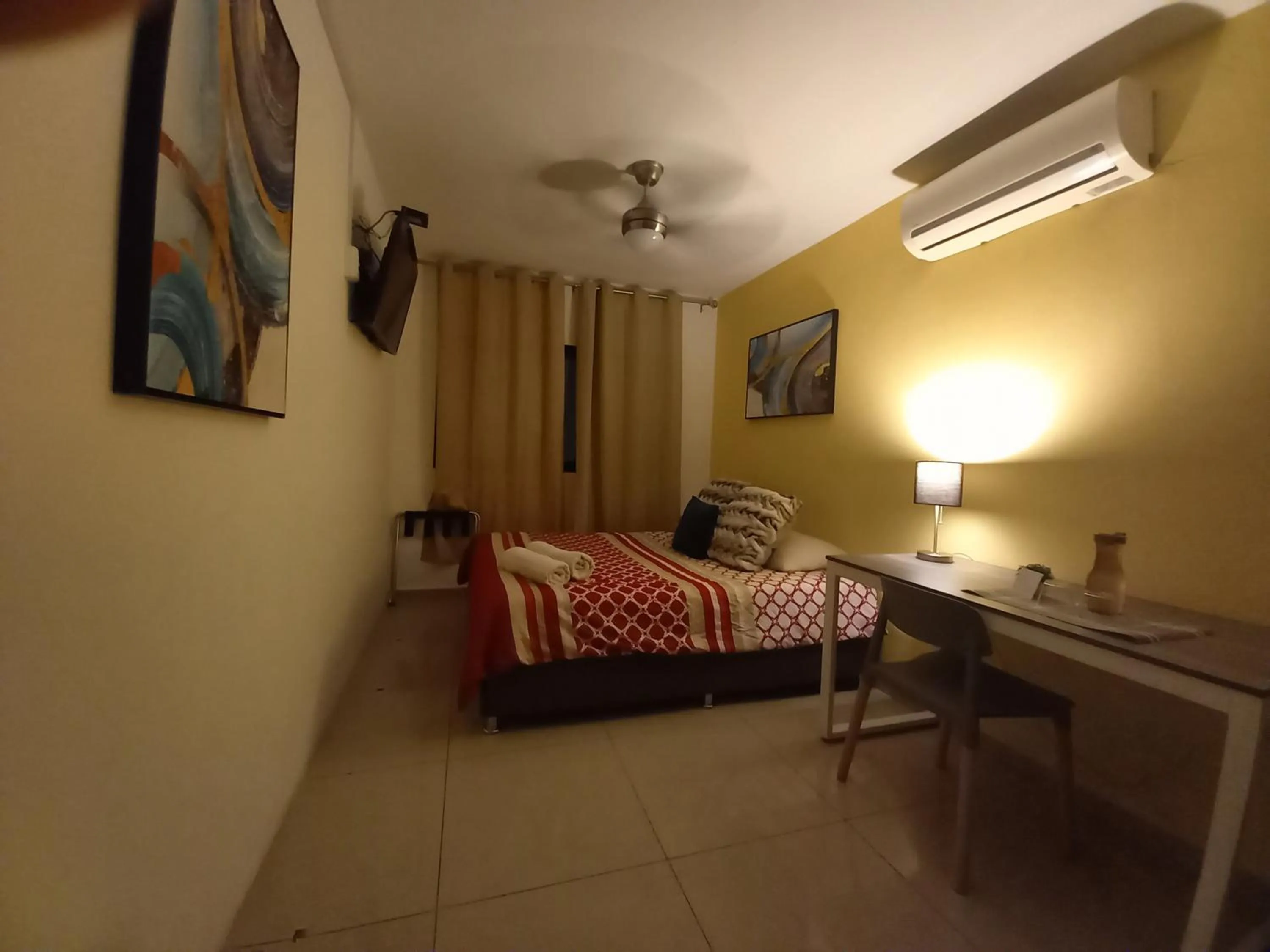 Bed in Capital O Tu Estancia