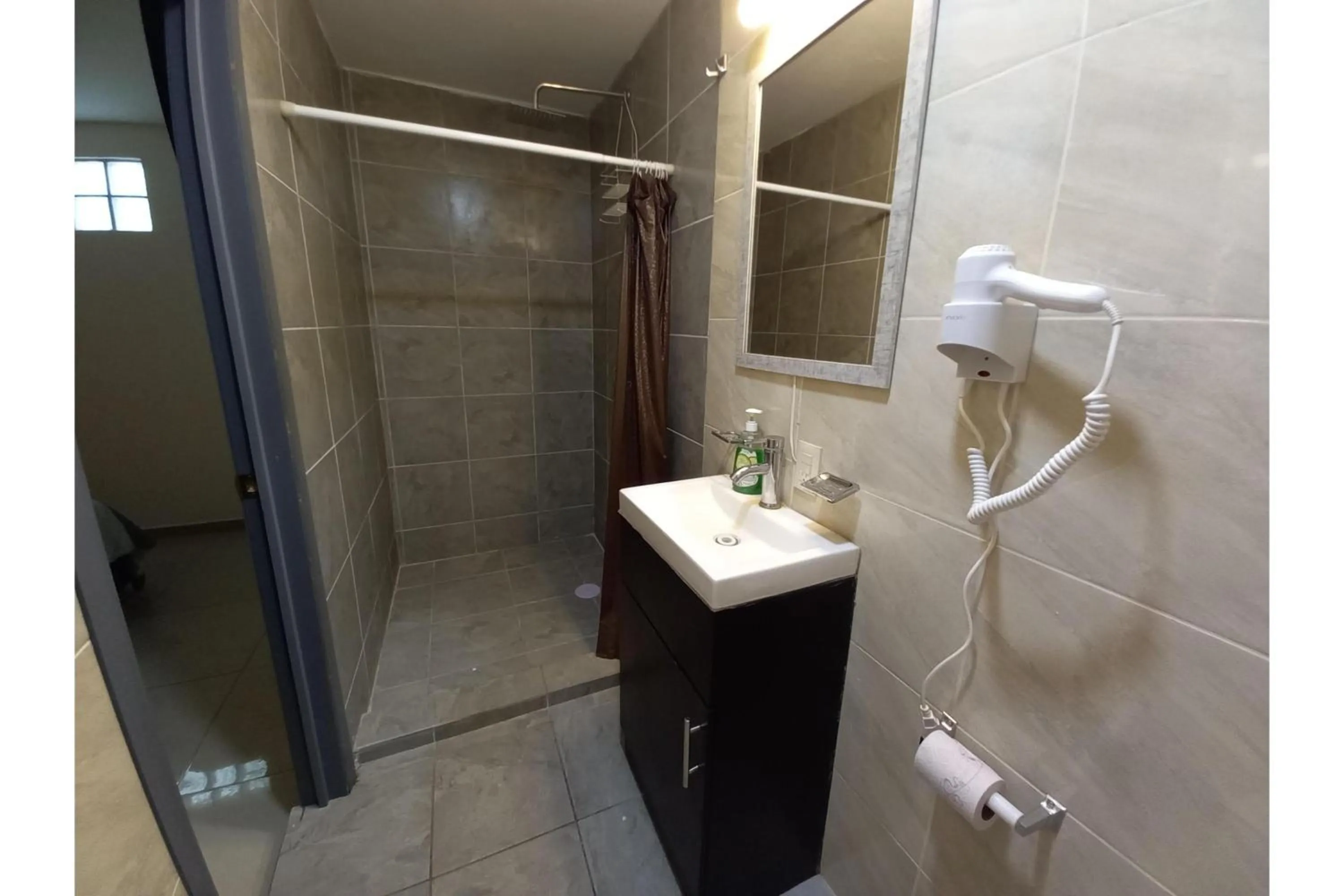 Bathroom in Capital O Tu Estancia Guadalajara