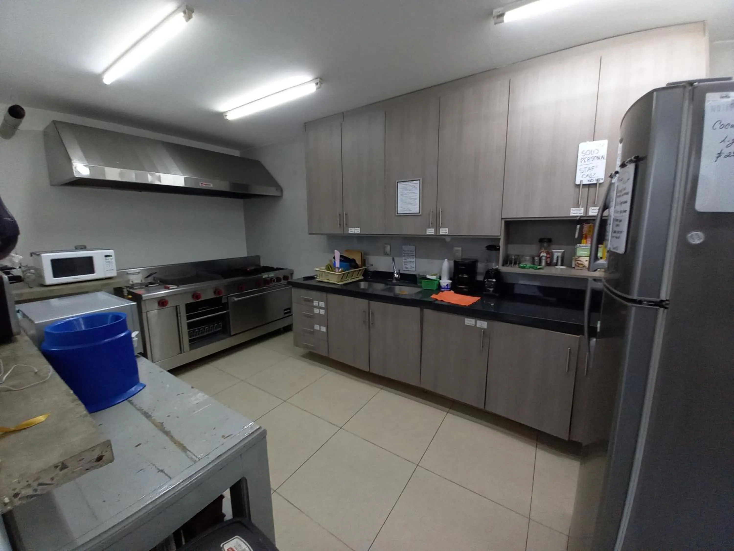 Kitchen or kitchenette in Capital O Tu Estancia