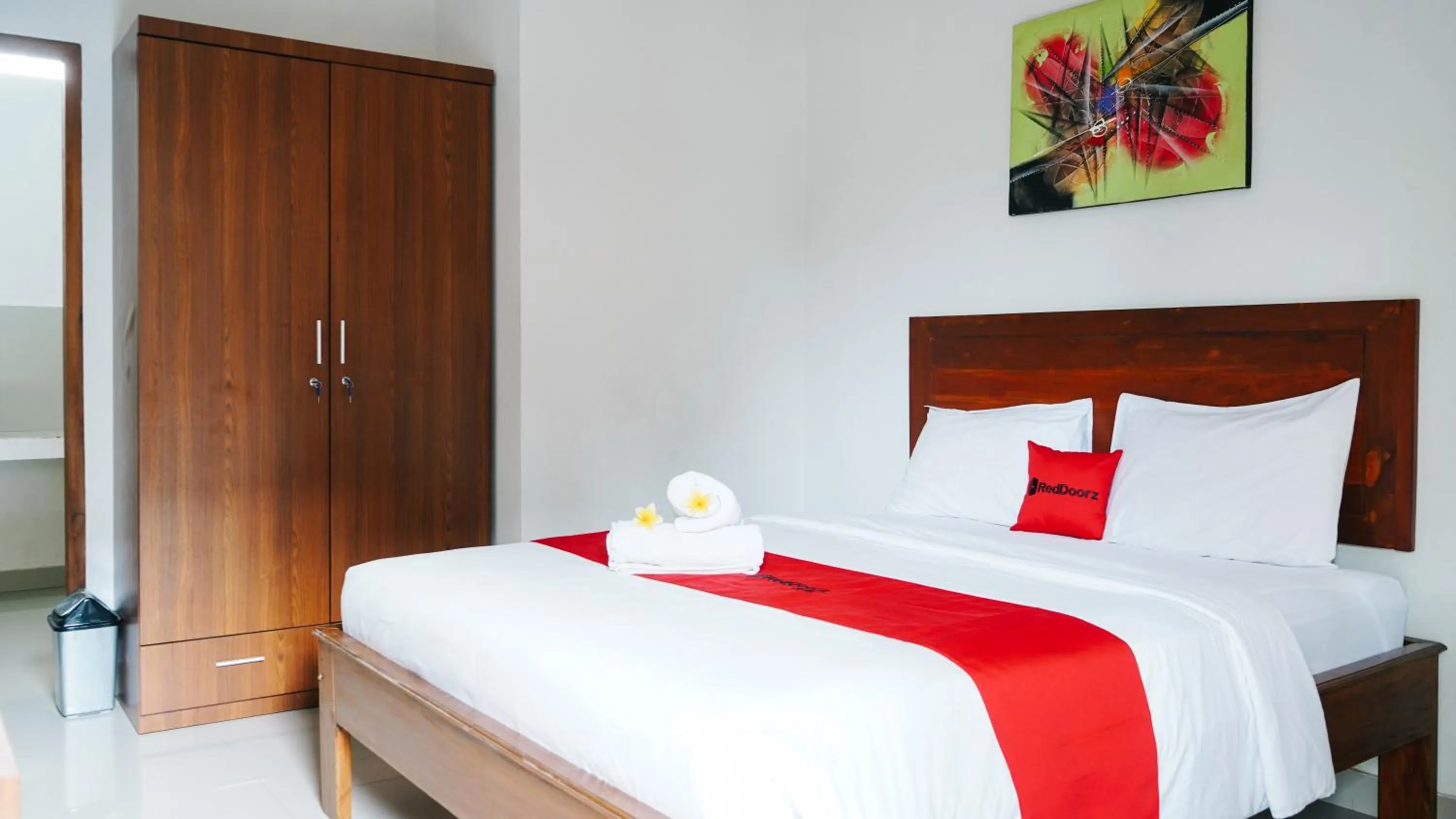 Bed in RedDoorz at Ampenan Mataram Lombok