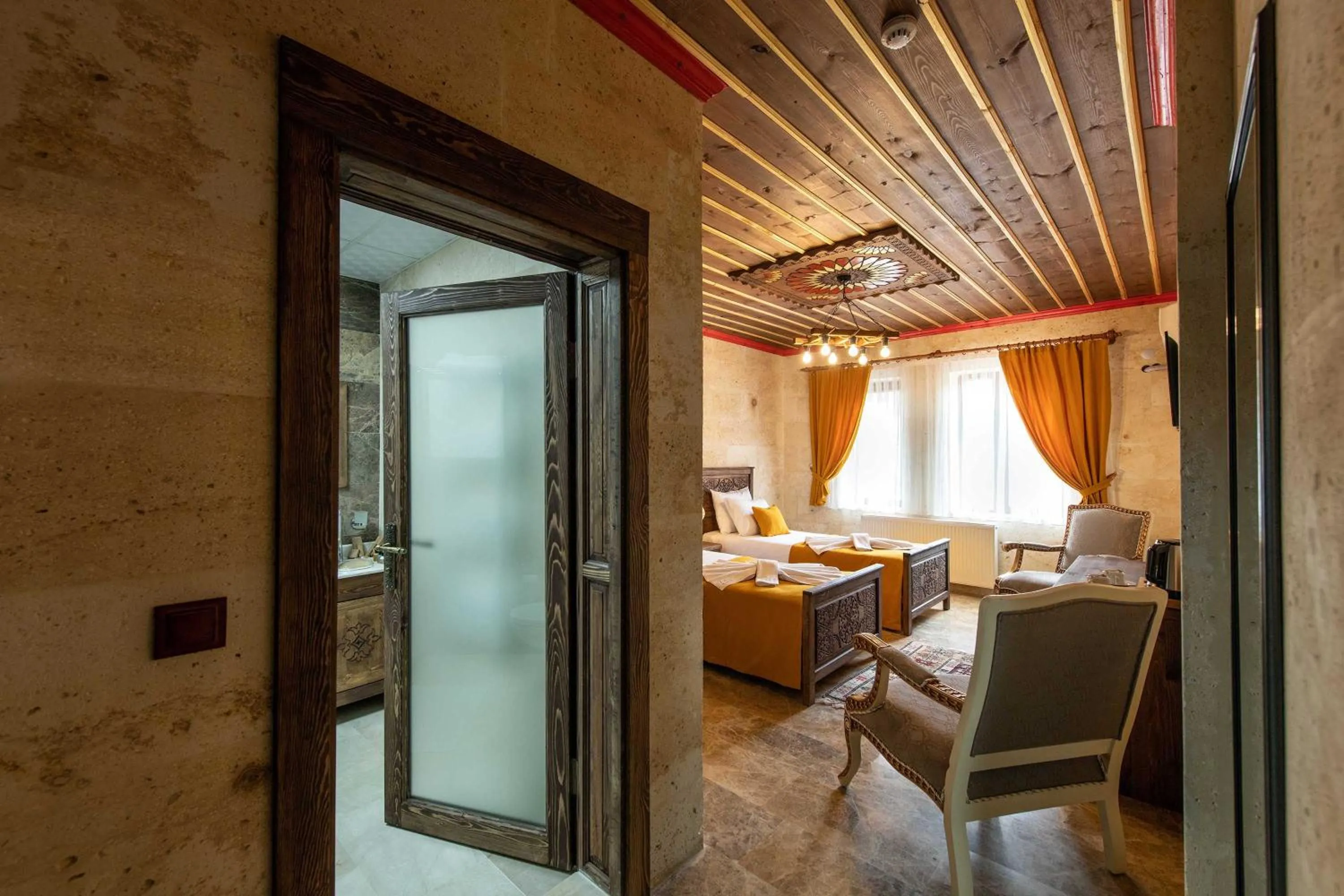 Photo of the whole room, Bed in Volare Stone Hotel