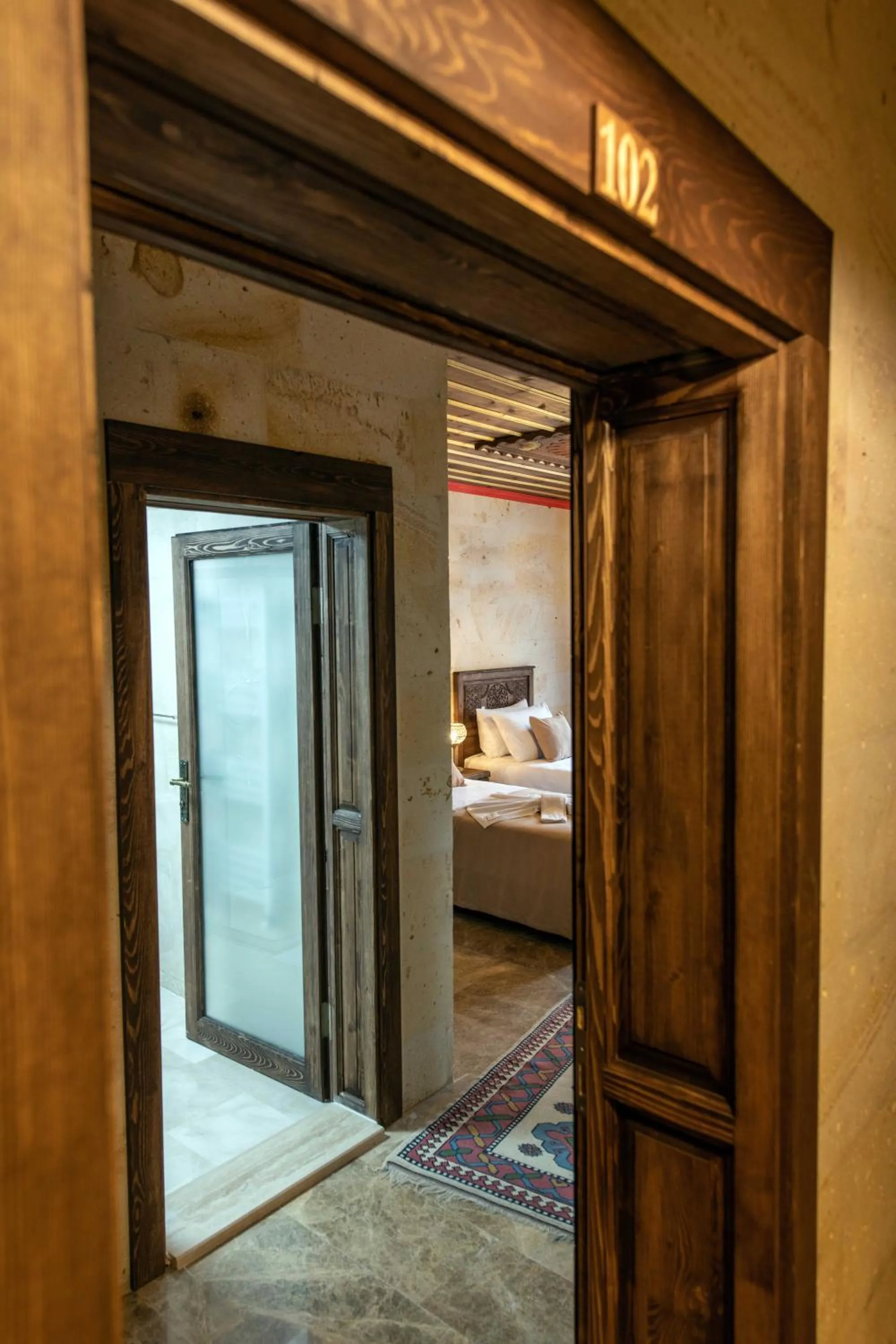 Facade/entrance, Bed in Volare Stone Hotel