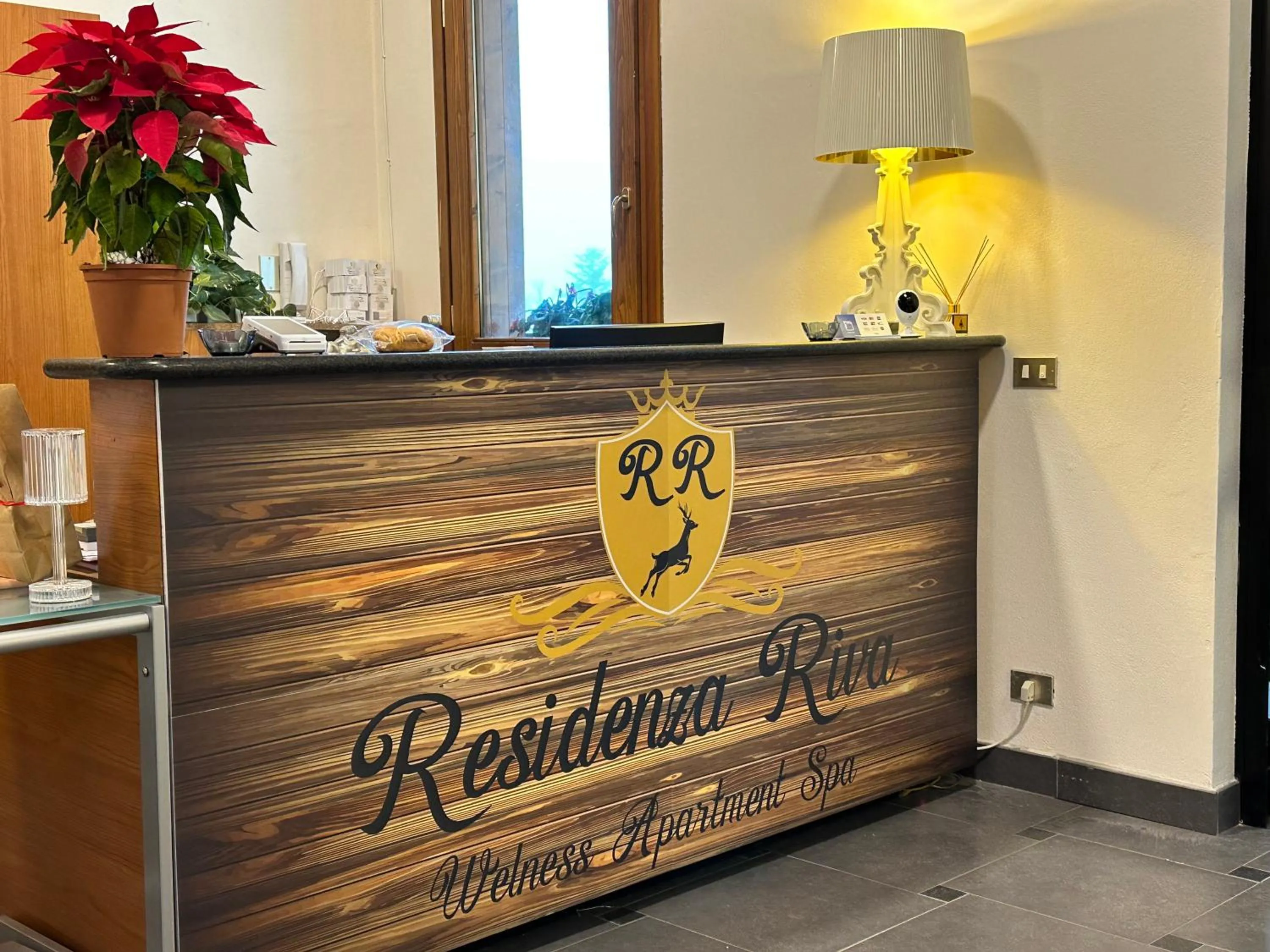 Lobby or reception in Residenza Riva Wellness Apartment Spa