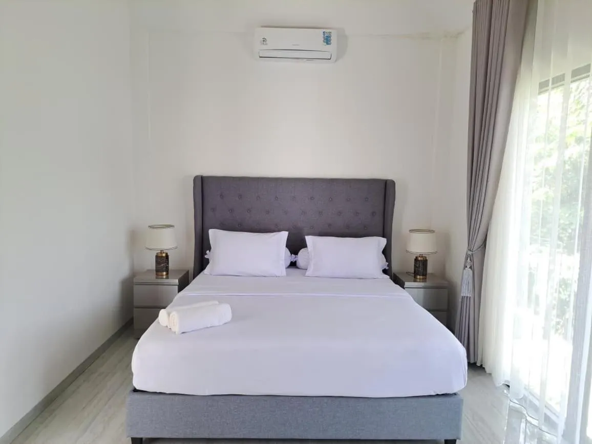 Bed in De Residence Pangandaran by Mabano Estates
