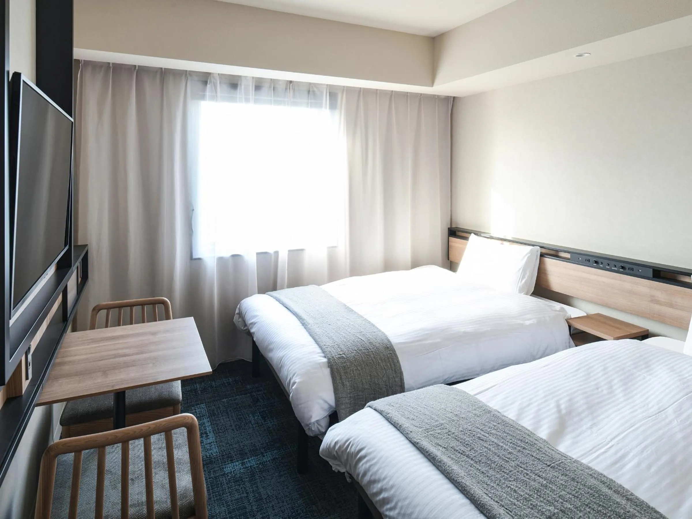 Bed in REF Kansai Airport by VESSEL HOTELS
