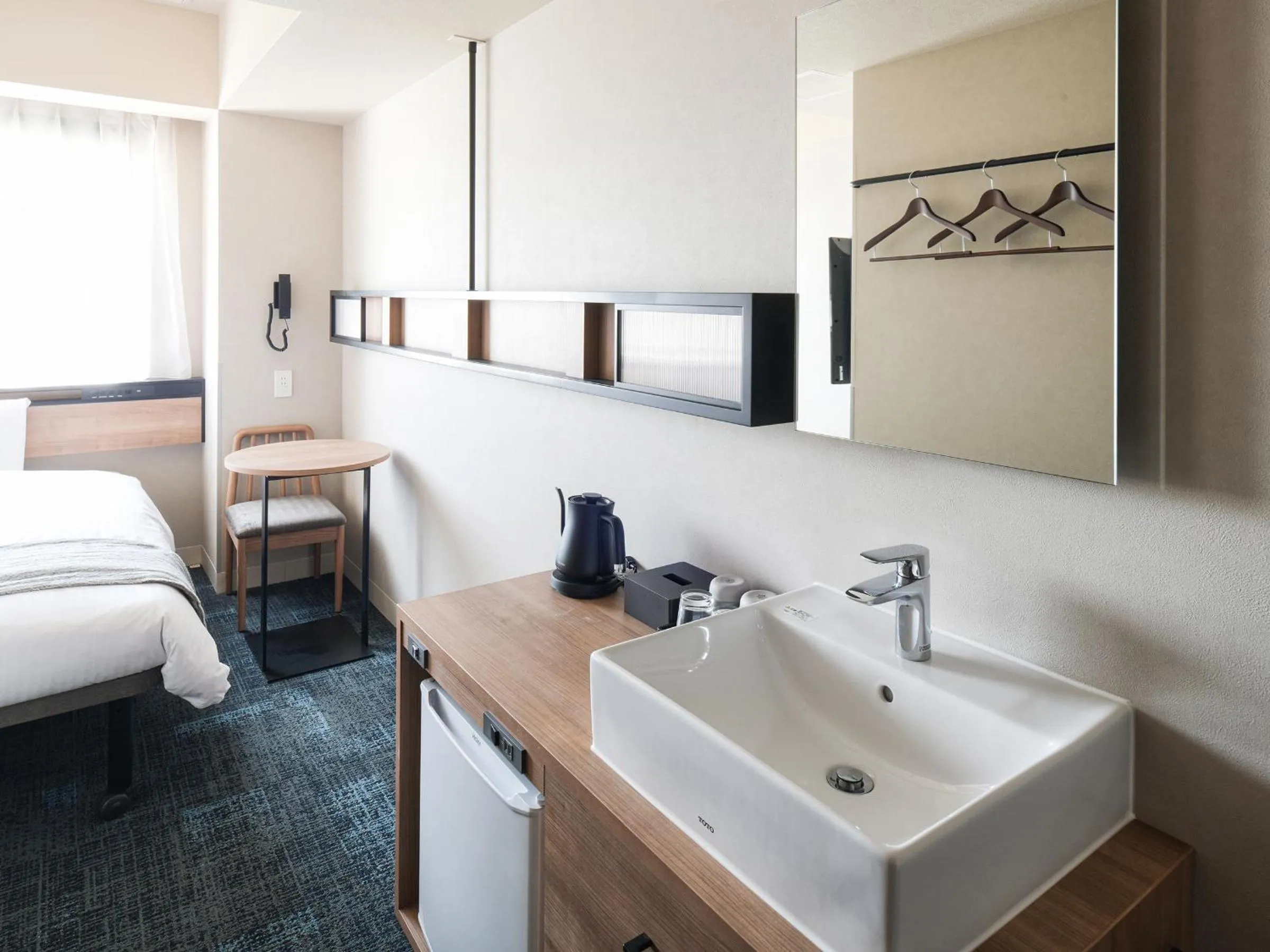 Bed in REF Kansai Airport by VESSEL HOTELS