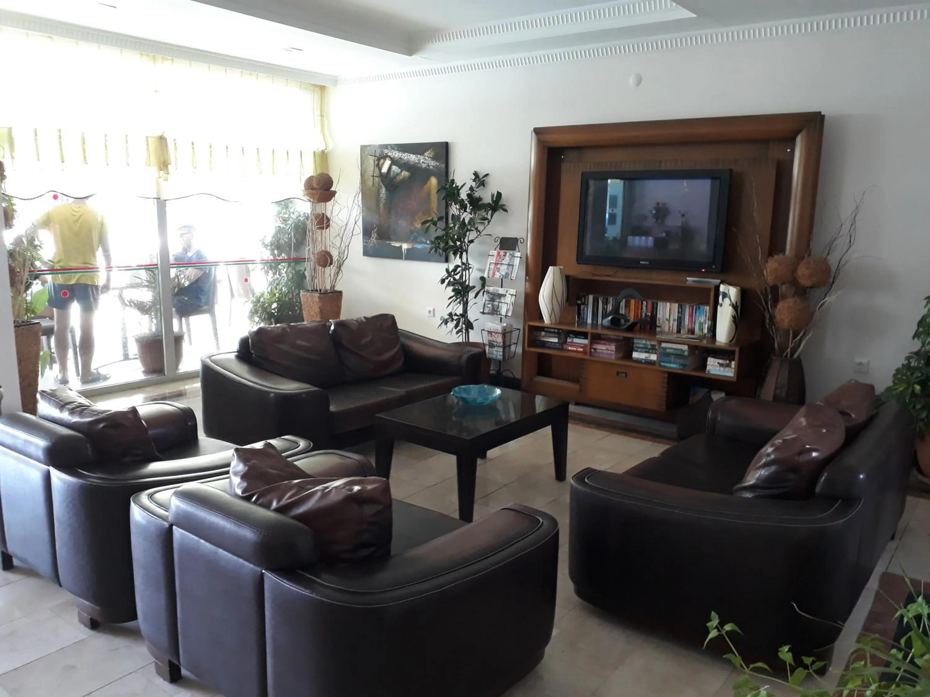 Communal lounge/ TV room in Marmaris Alkan Hotel