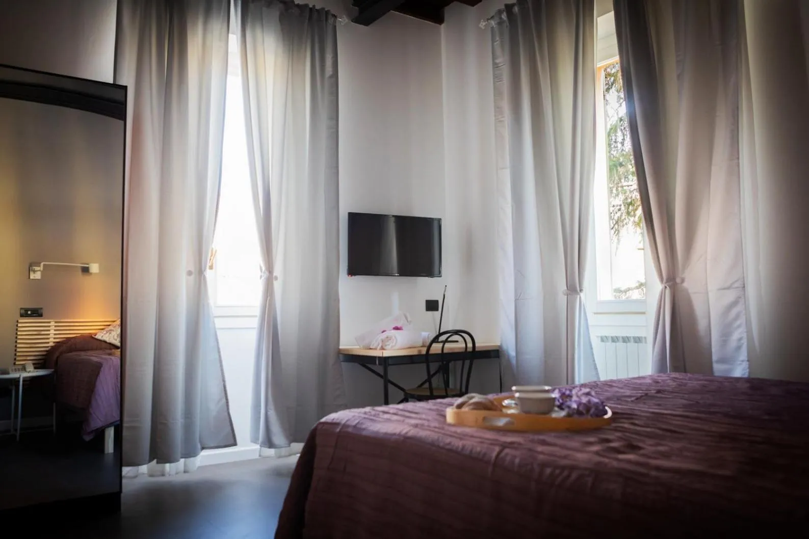 Bedroom, Bed in Hotel Milano Pool & Garden