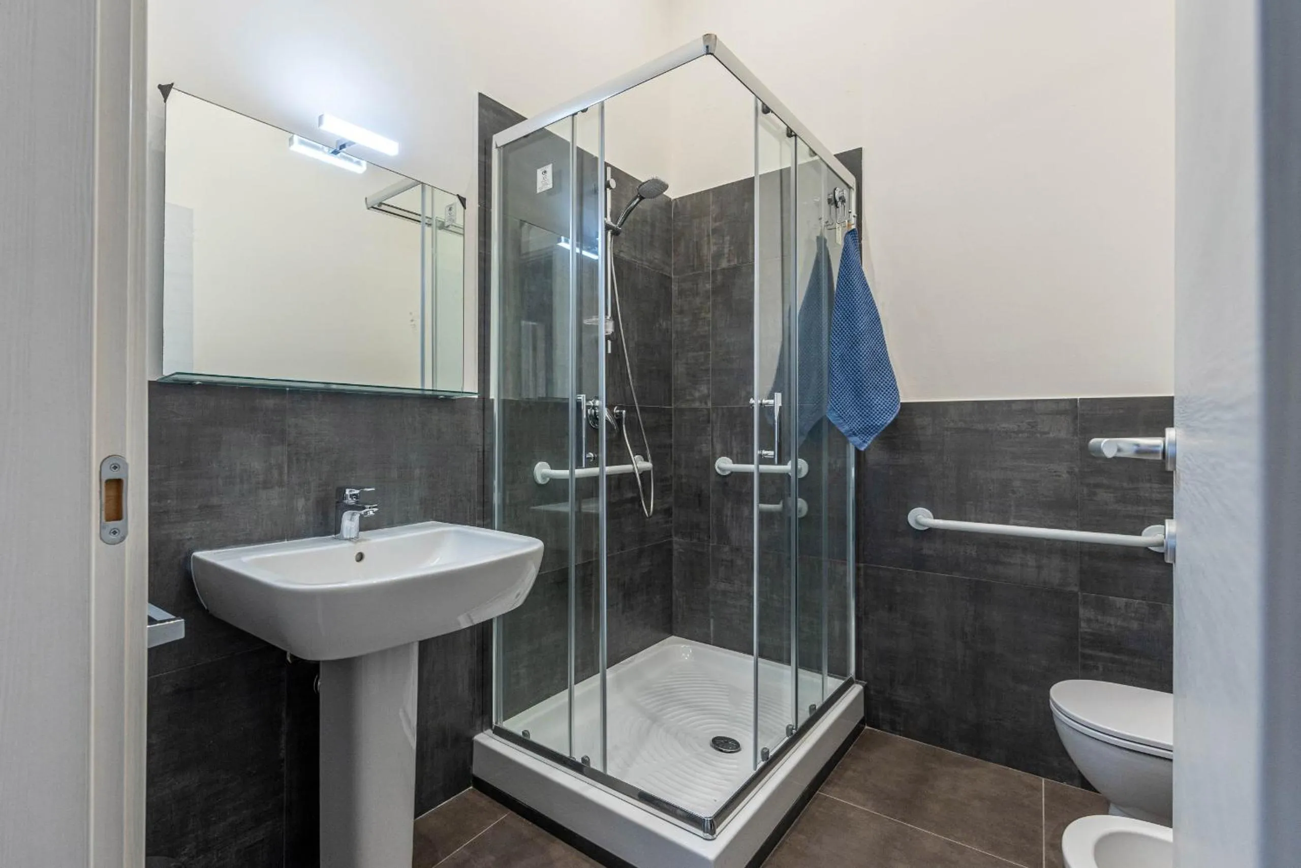 Bathroom in Apartments La Cala by Wonderful Italy